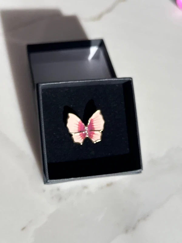 Striking Butterfly ring in enamel pinks set in gold metal size 6 brand new,