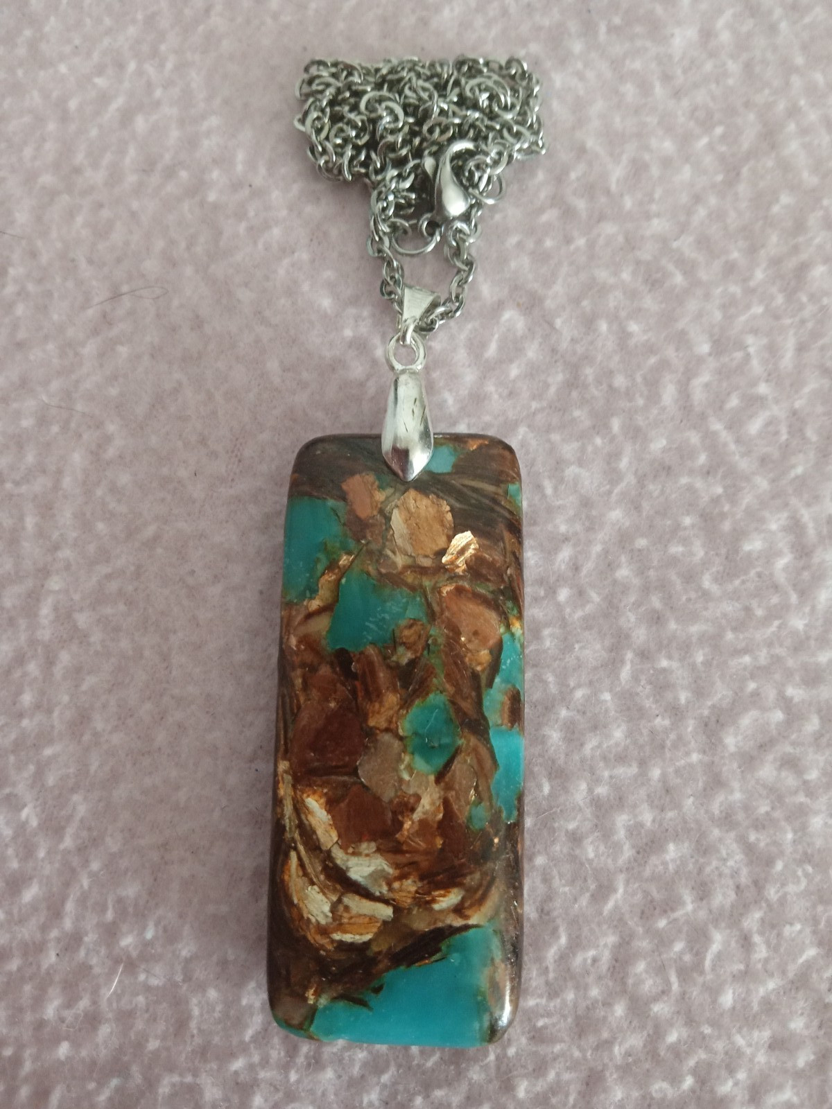 Color enhanced Stne pendant with 18 inch chain