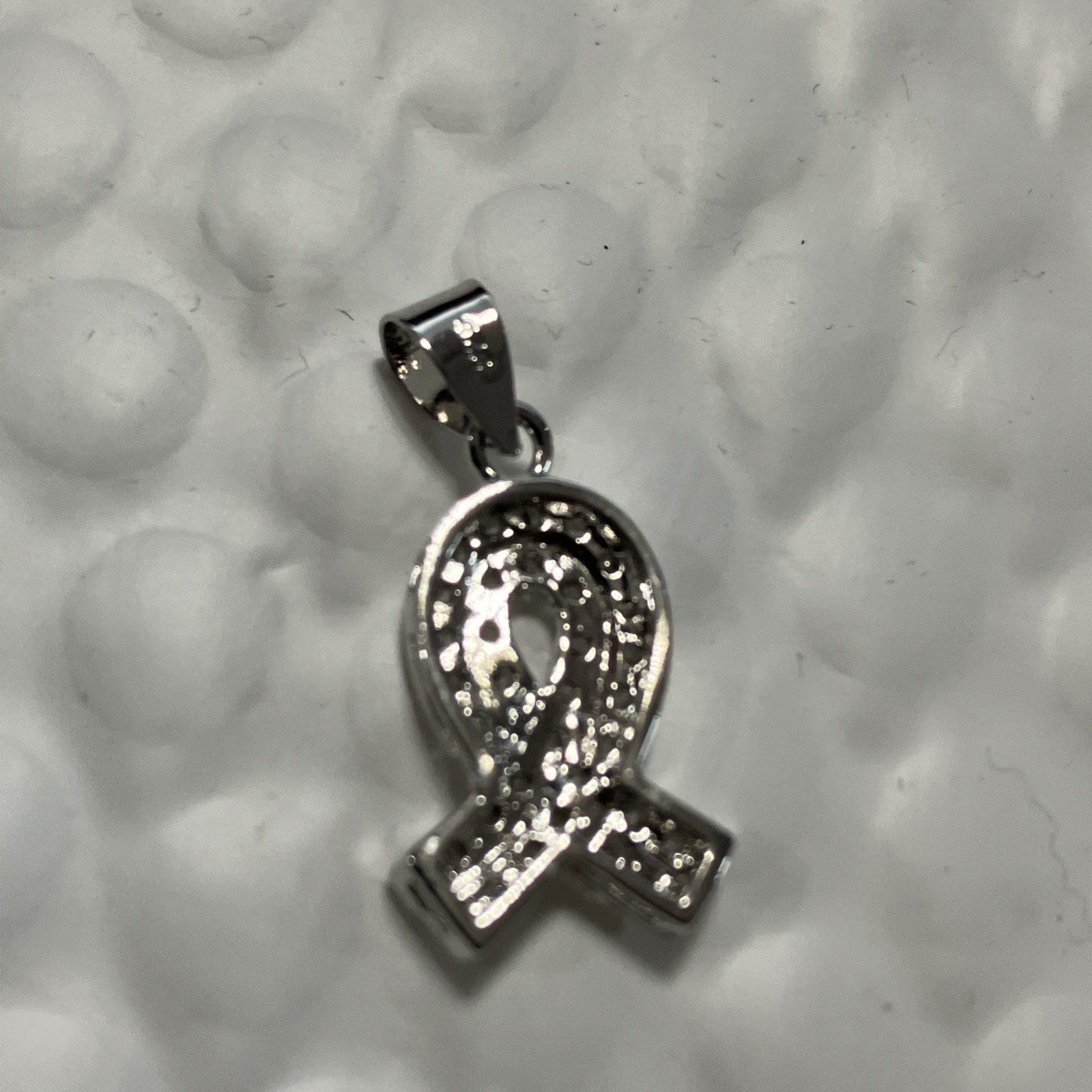 925 Sterling Silver Ribbon Pendant With CZ Stones 2.4 Grams Total Weight