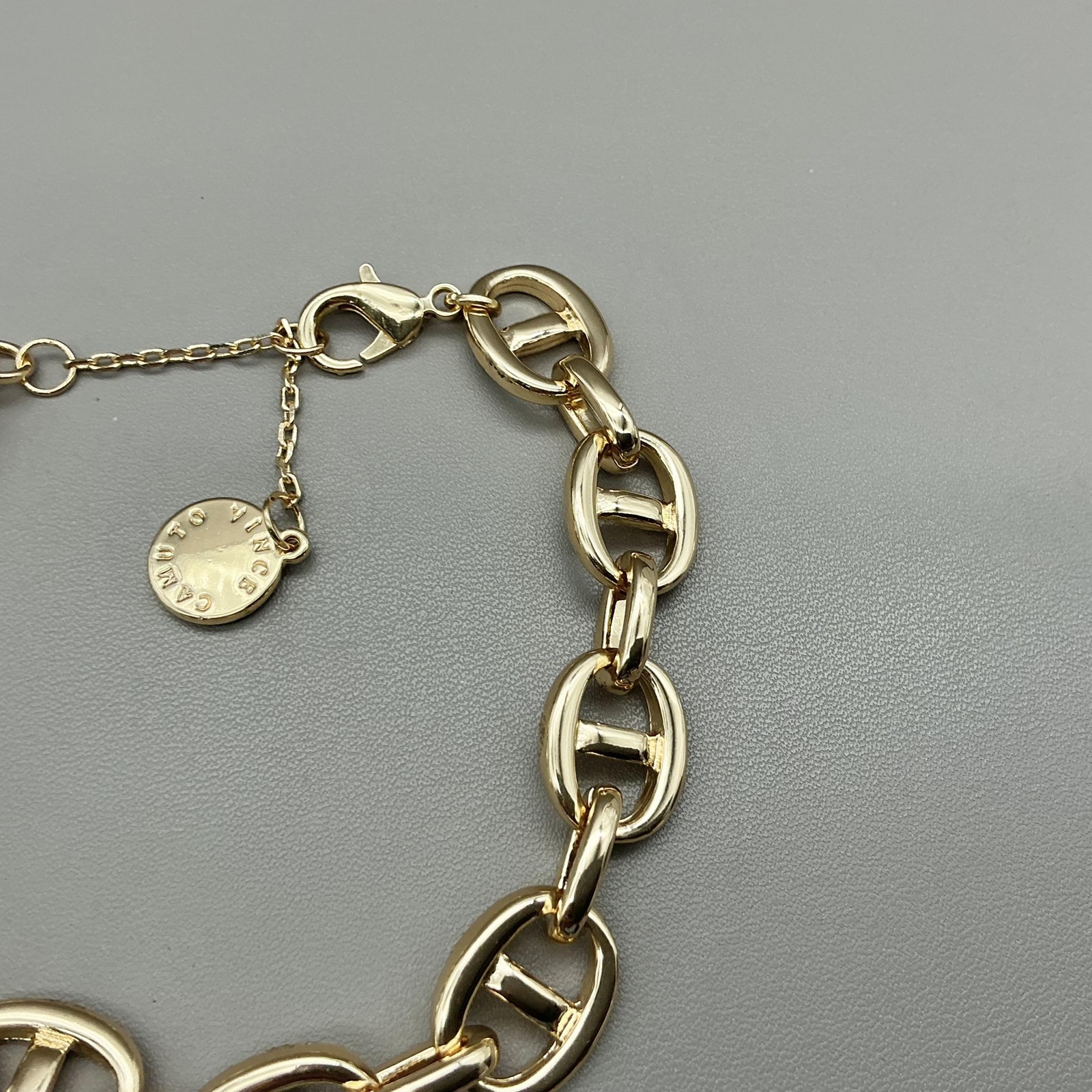Vince Camuto Bracelet Gold Tone Chain Link Womens Logo Charm Lobster Clasp 8″