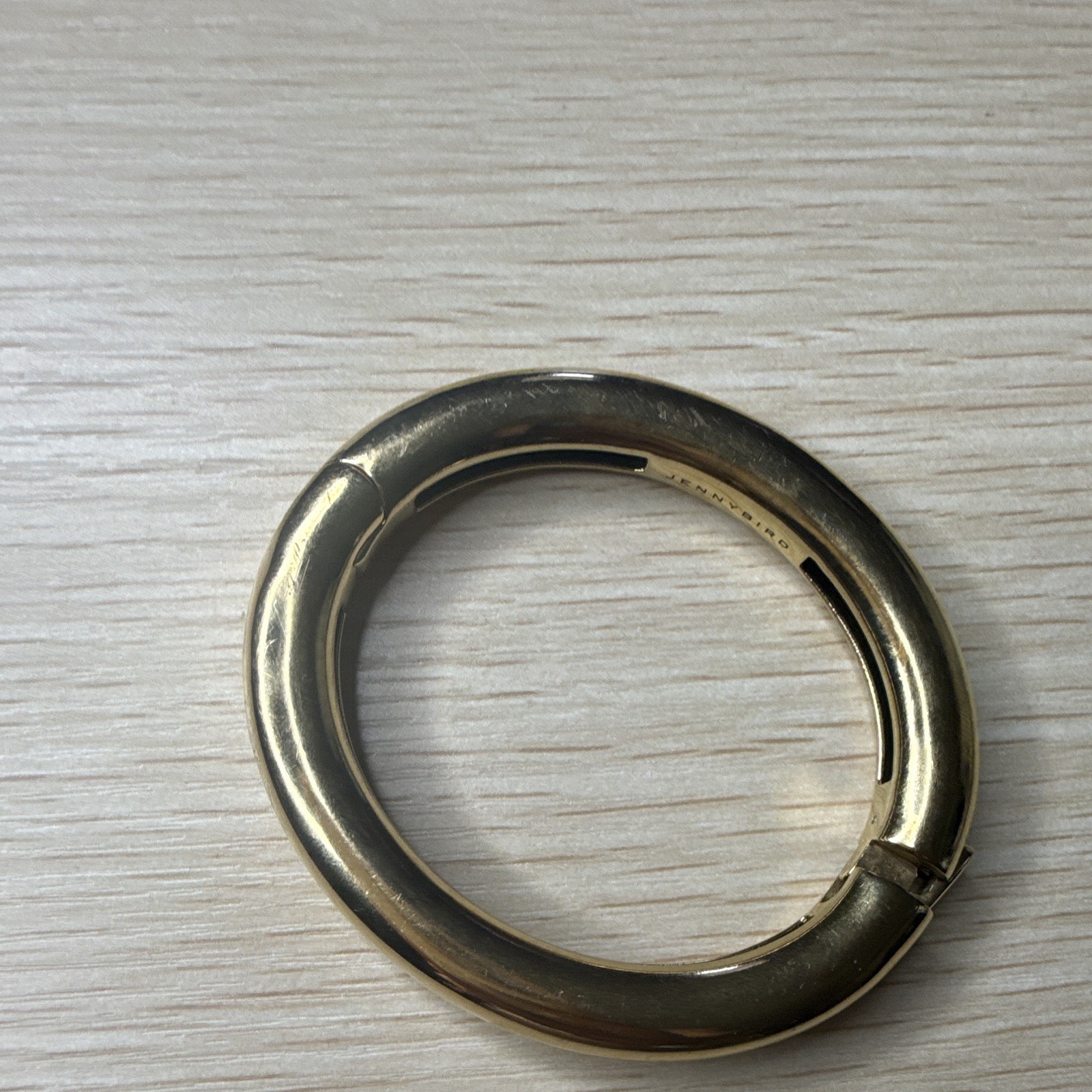 Jenny Bird Gold Tone Hinged Bangle Bracelet, Signed, No Stone