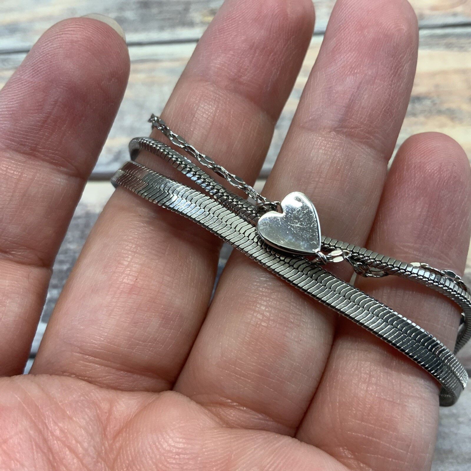 Modern adjustable layered herringbone chain heart bracelet in silver tone