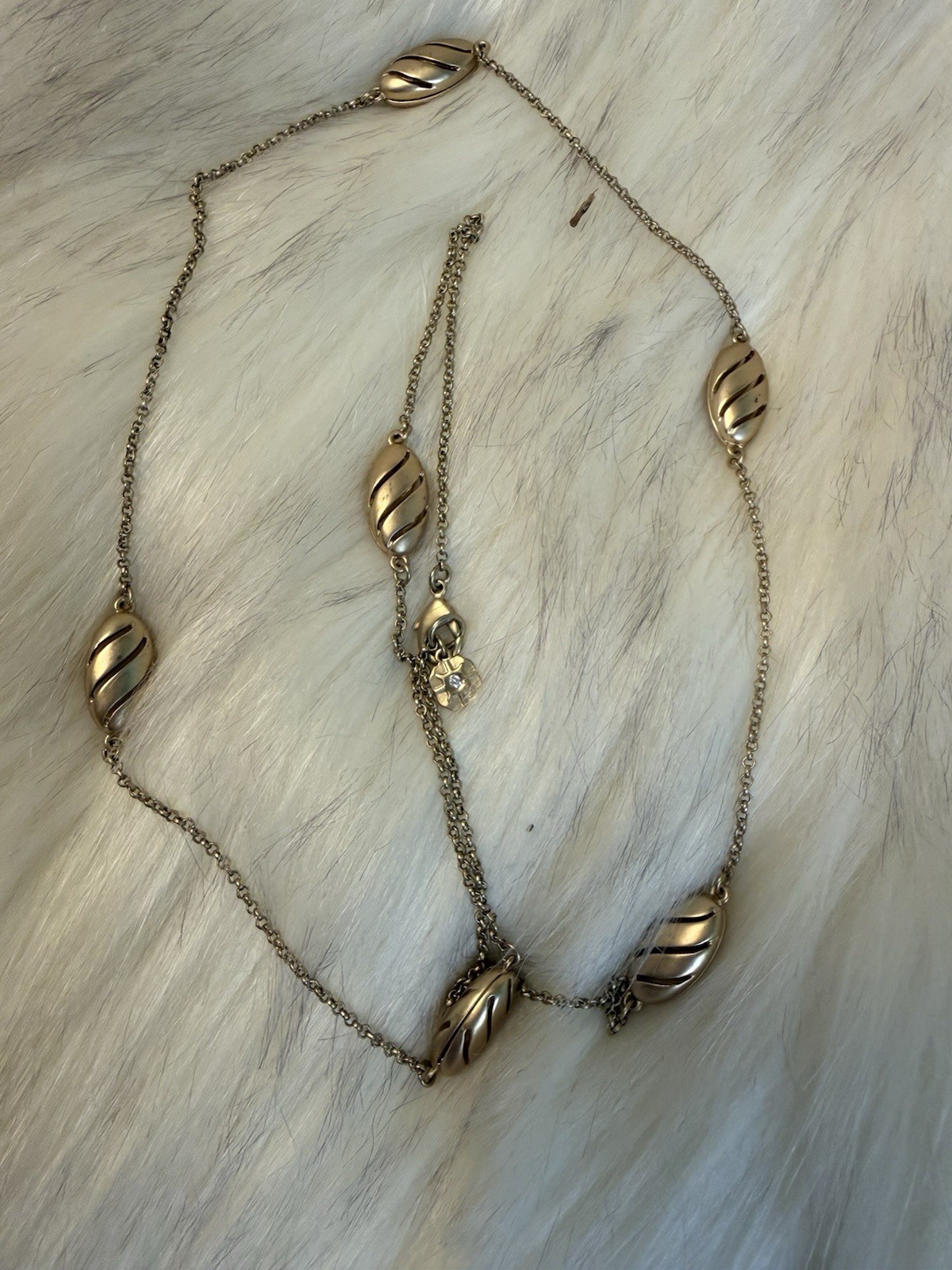 Gold Tone vintage Monet necklace 16 inch drop. Long classic Monet look