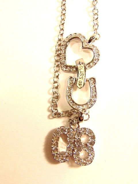 pre-owned silver colored necklace with white crystals “Class of 08”