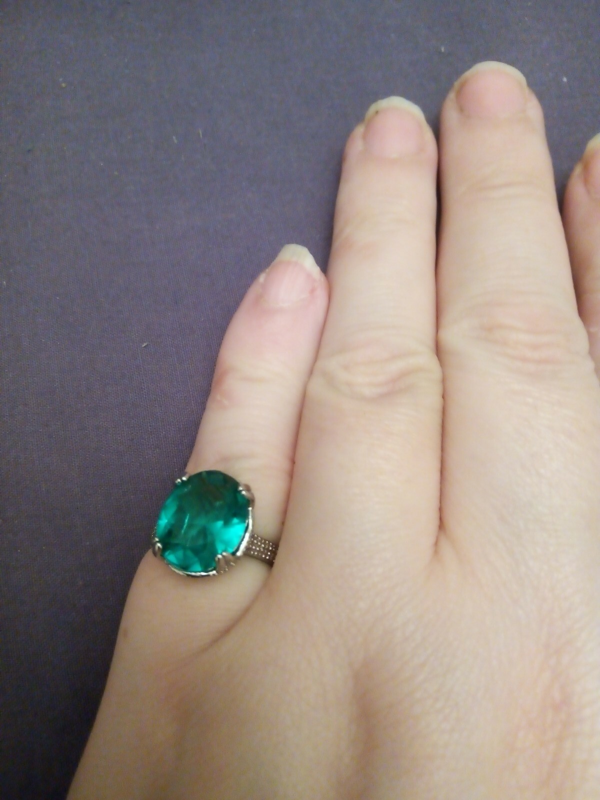 SizeUK J and USA 4.5 Possibly silver ring Green oval cut claw set ring