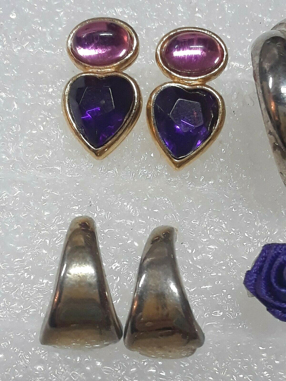 Pierced earrings with stones. pink, purple, clear. gold tone silver tone. 8 pair