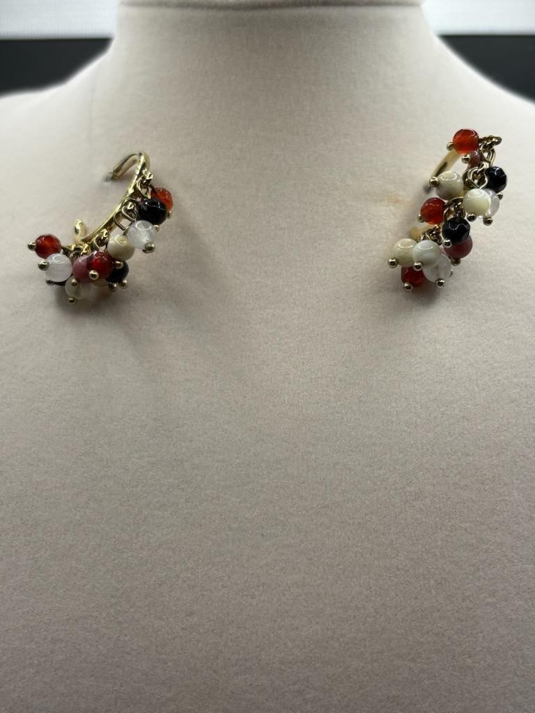 A&I gold tone black, white, tan, pink, red beaded hoop dangle earrings, Studs