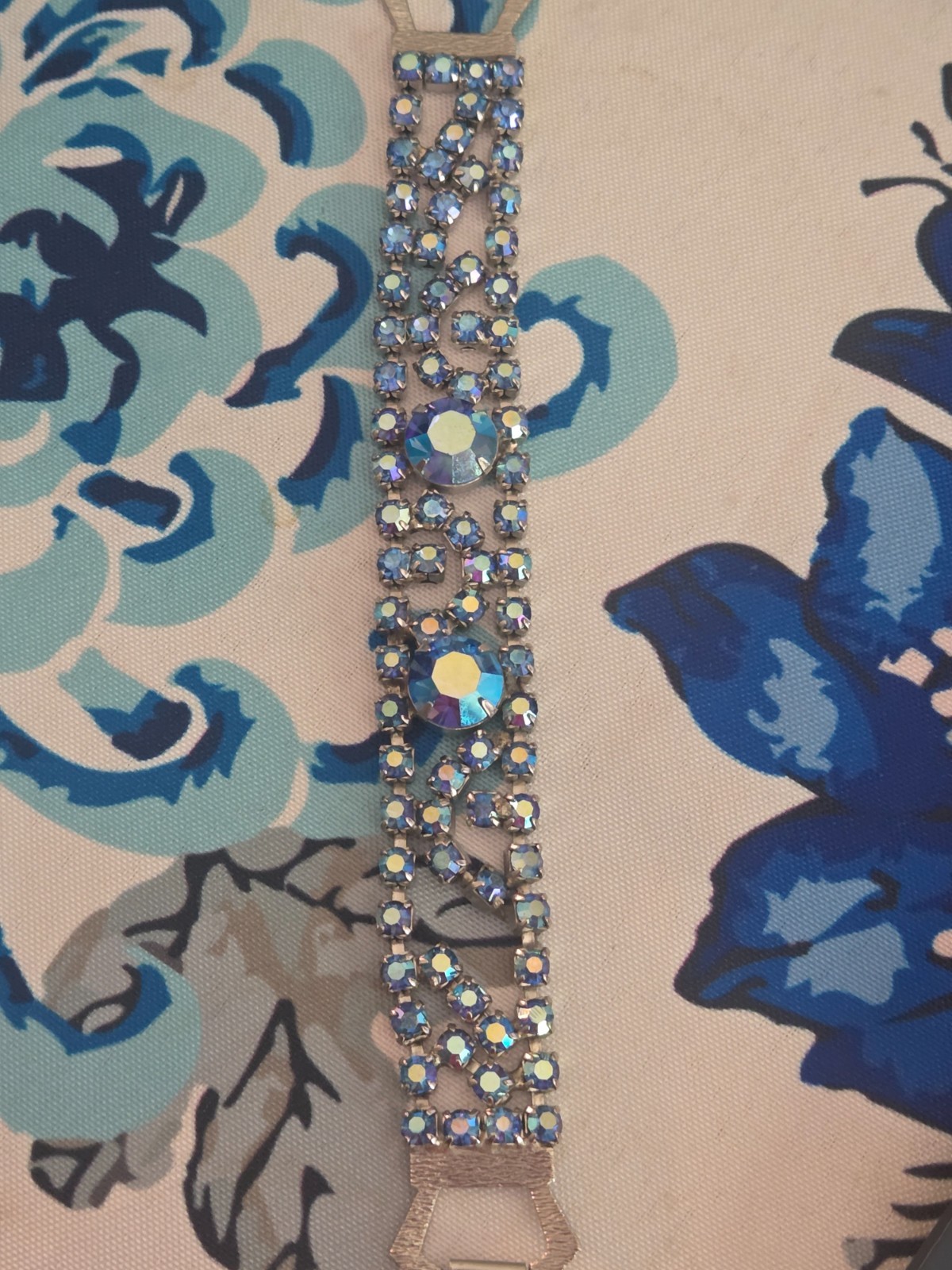 Iridescent blue rhinestone bracelet possibly vintage. Eight inches around