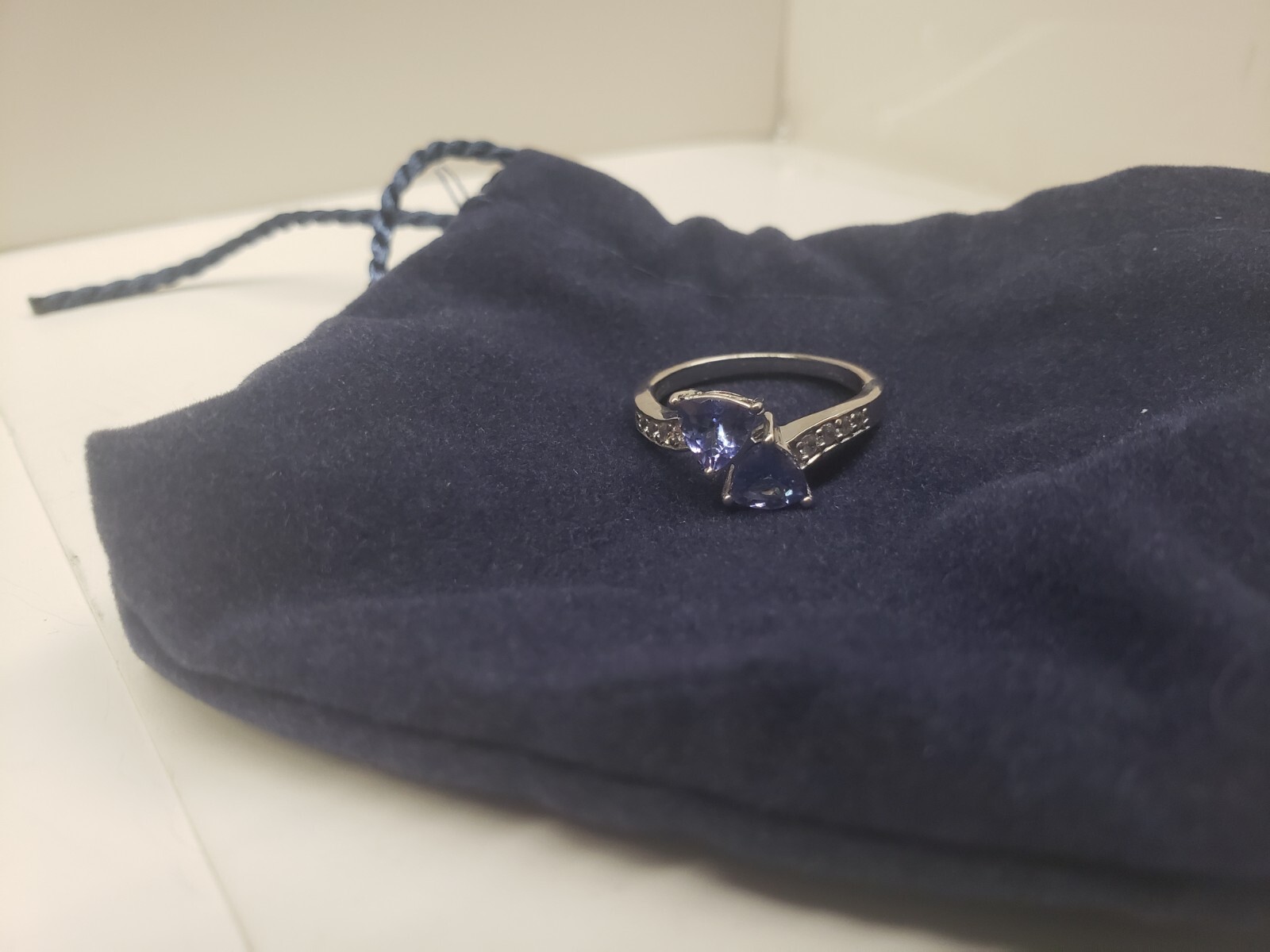 6.0mm Trillion-Cut Tanzanite and White Zircon Duo Bypass Ring in Sterling Silver
