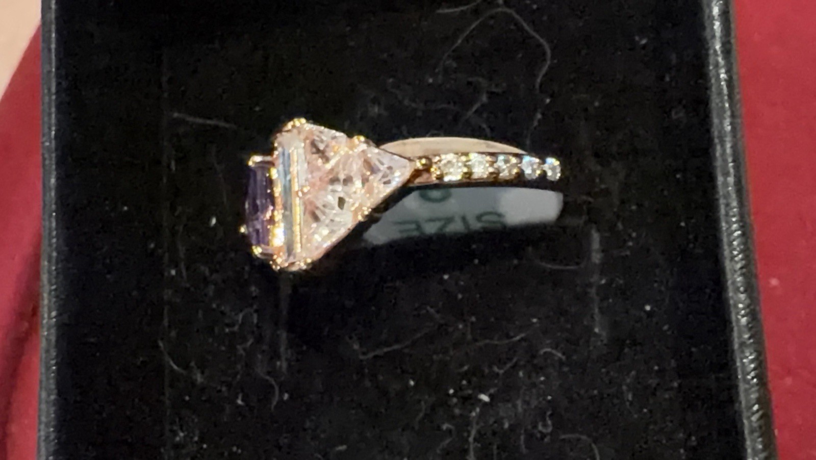 Rose gold no idea on the stones they are a pinkish color