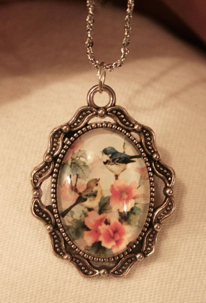 Delightful Swooped Rim Openwork Blue Birds Sitting in Flowers Silvertn Necklace
