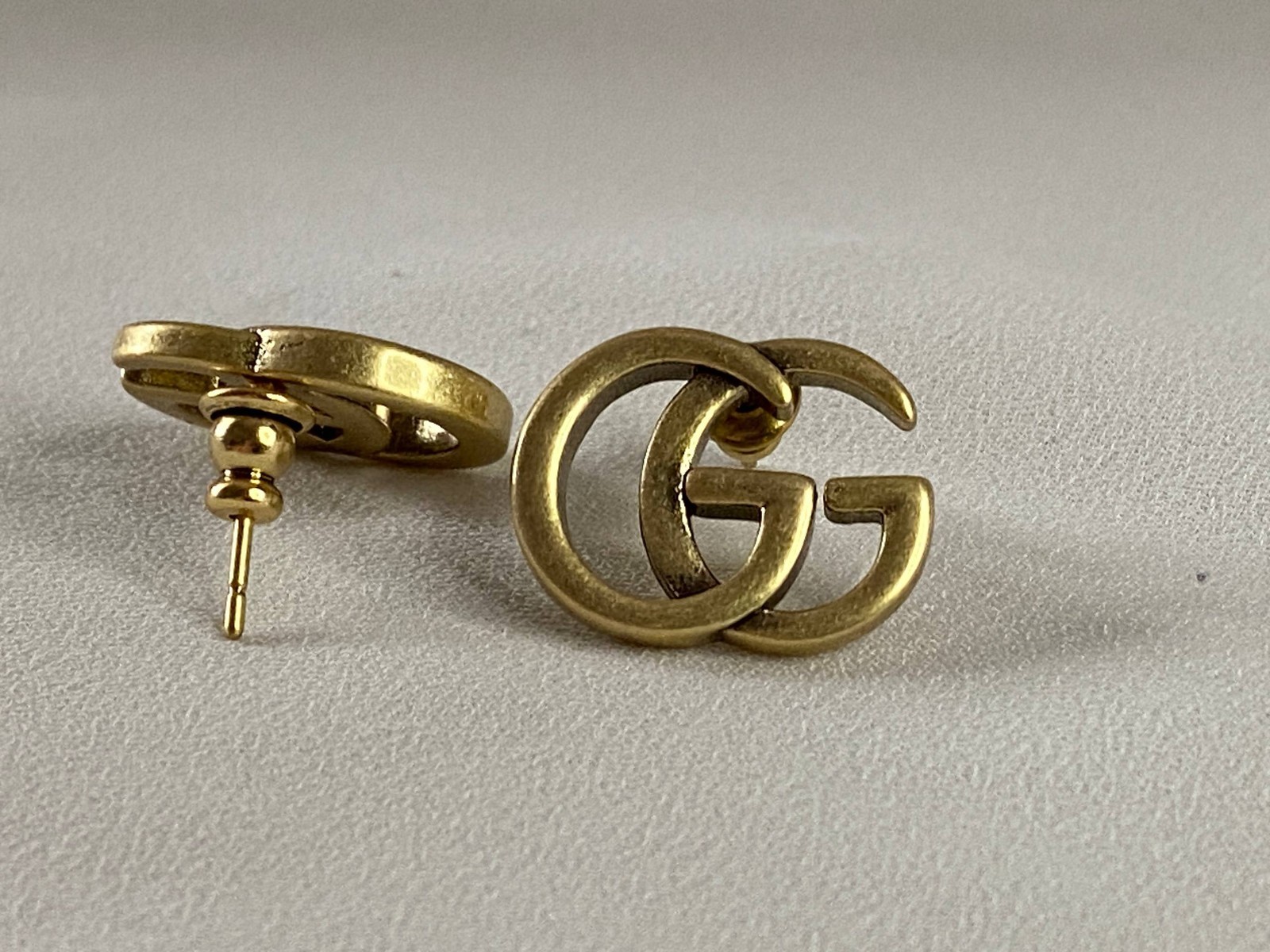 Gucci Interlocking GG Logo Stud Earrings Gold Tone Made in Italy