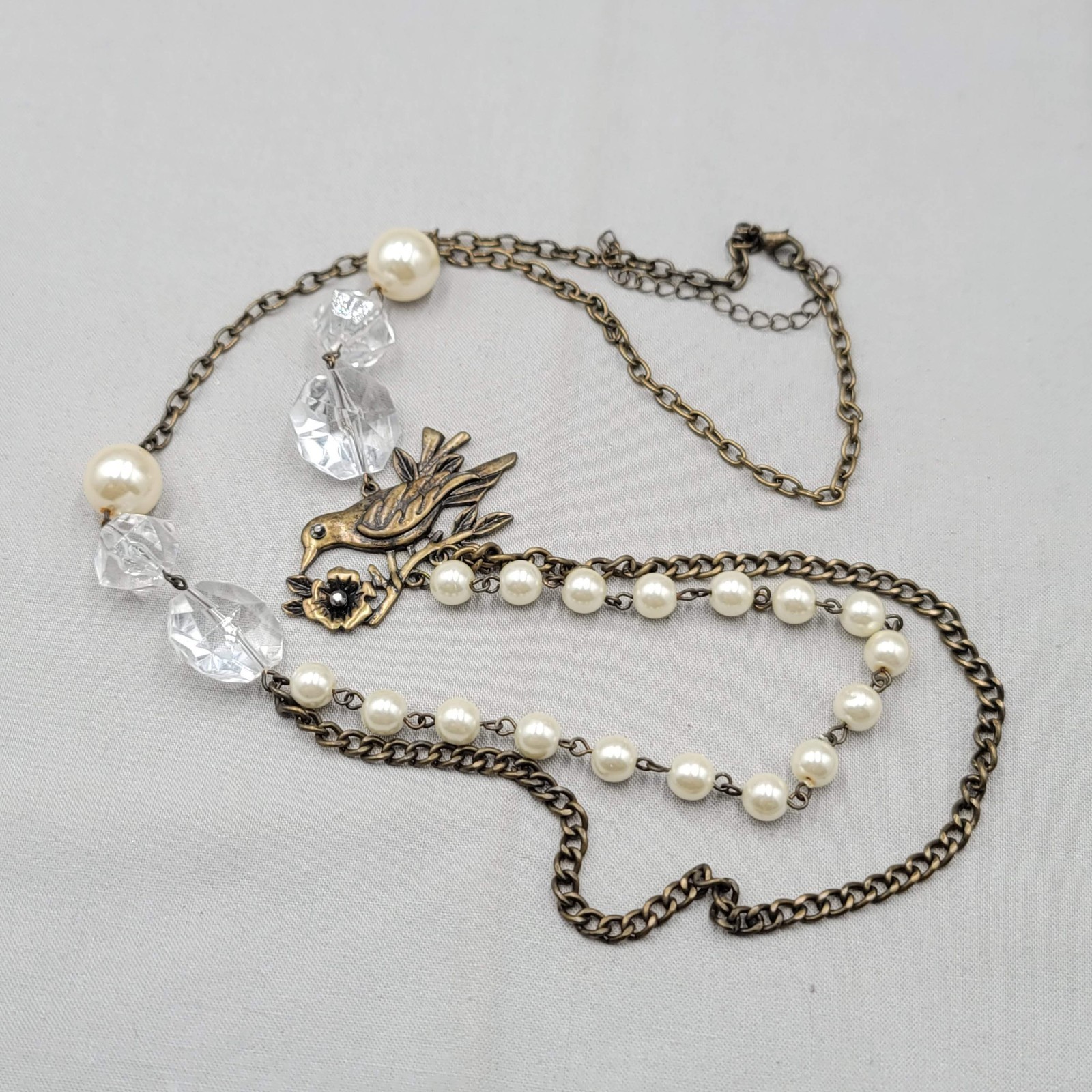 Embossed Metal Bird White Bead Necklace Bronze tone Chain 32″