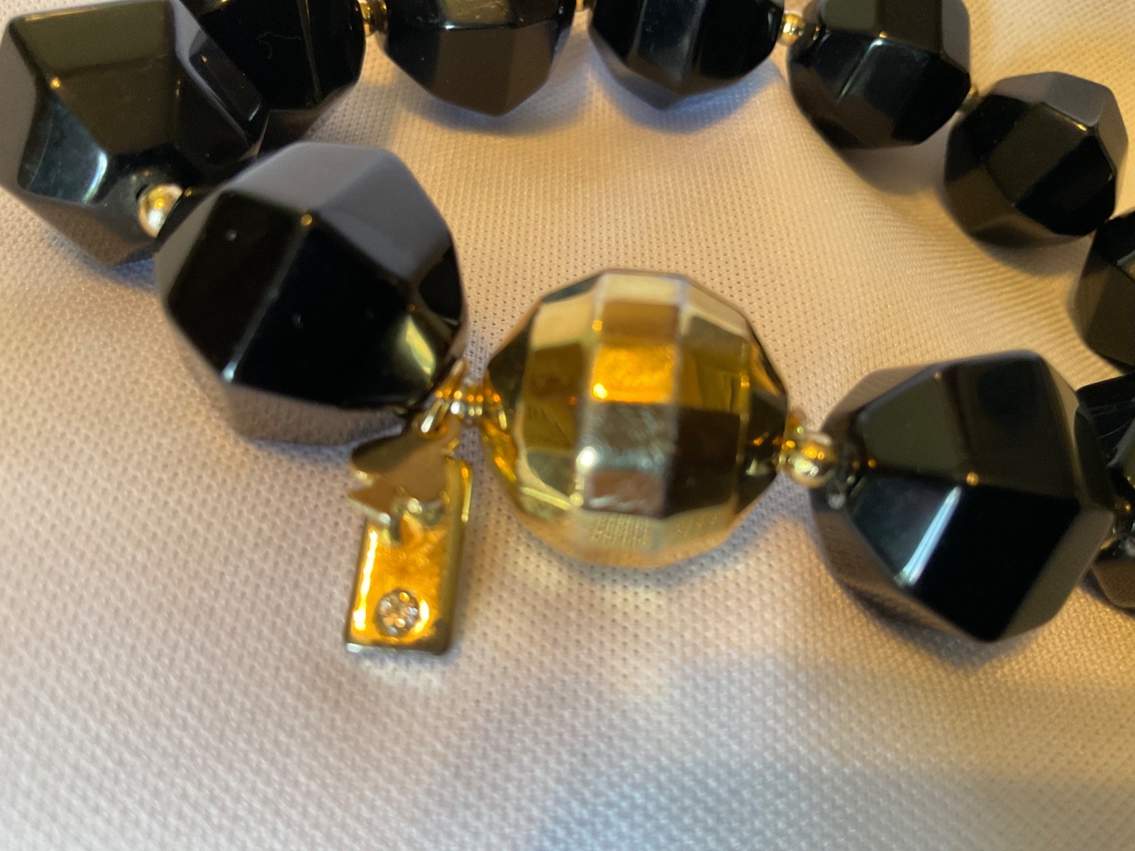 kate spade New York black and gold fauceted bead bracelet