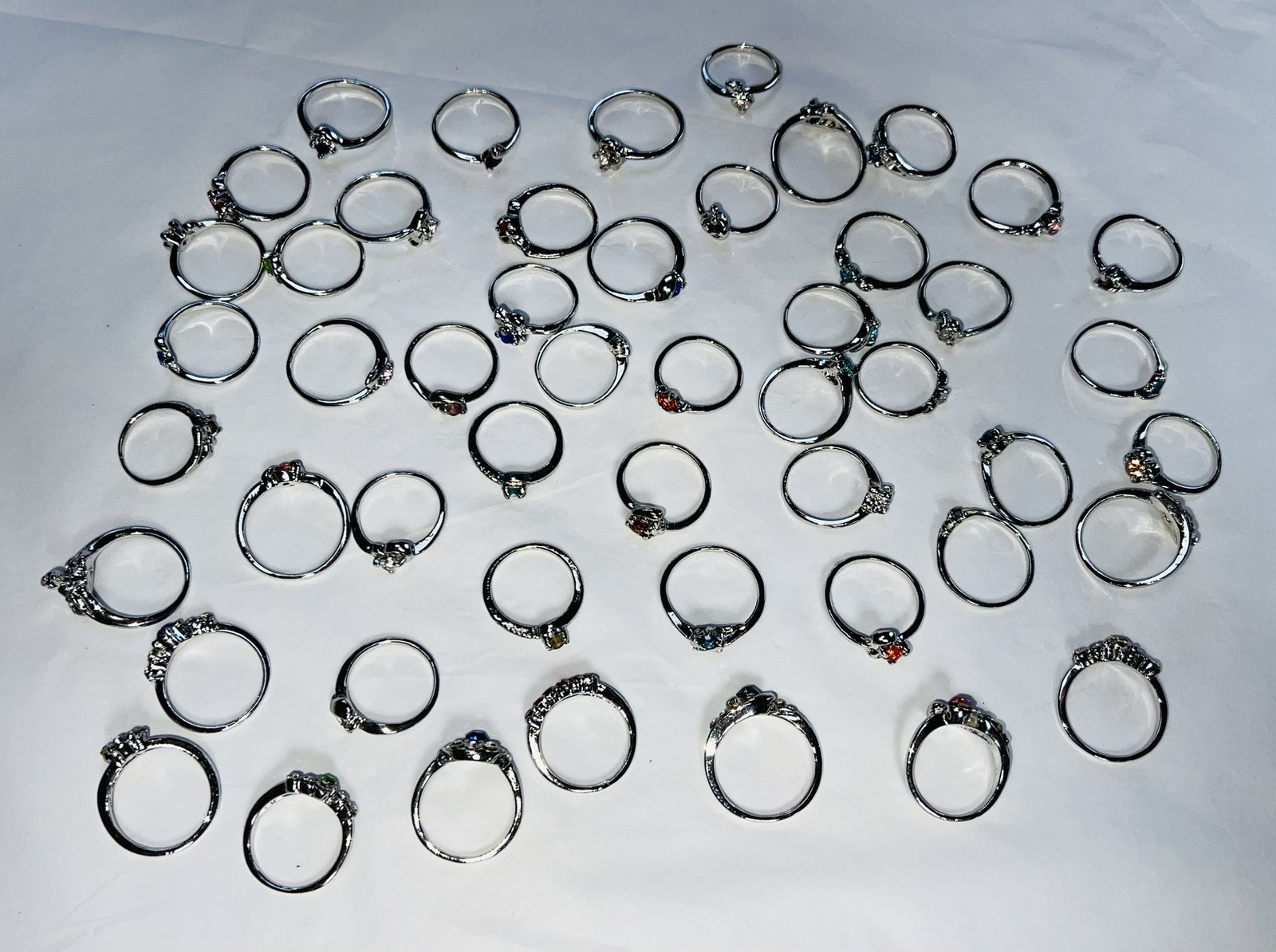 Bundle Of 50 Lovely Silver Coloured Rhinestone RINGS Single & Multiple Gem Stone