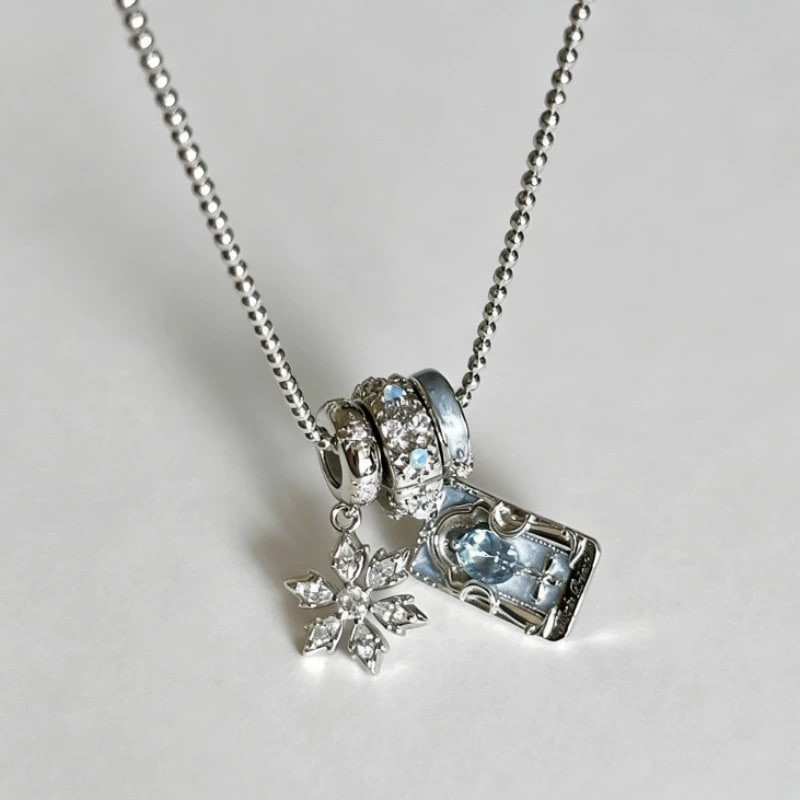 Silver Winter Snowflake Blue Cubic‑Zirconia Charm Necklace