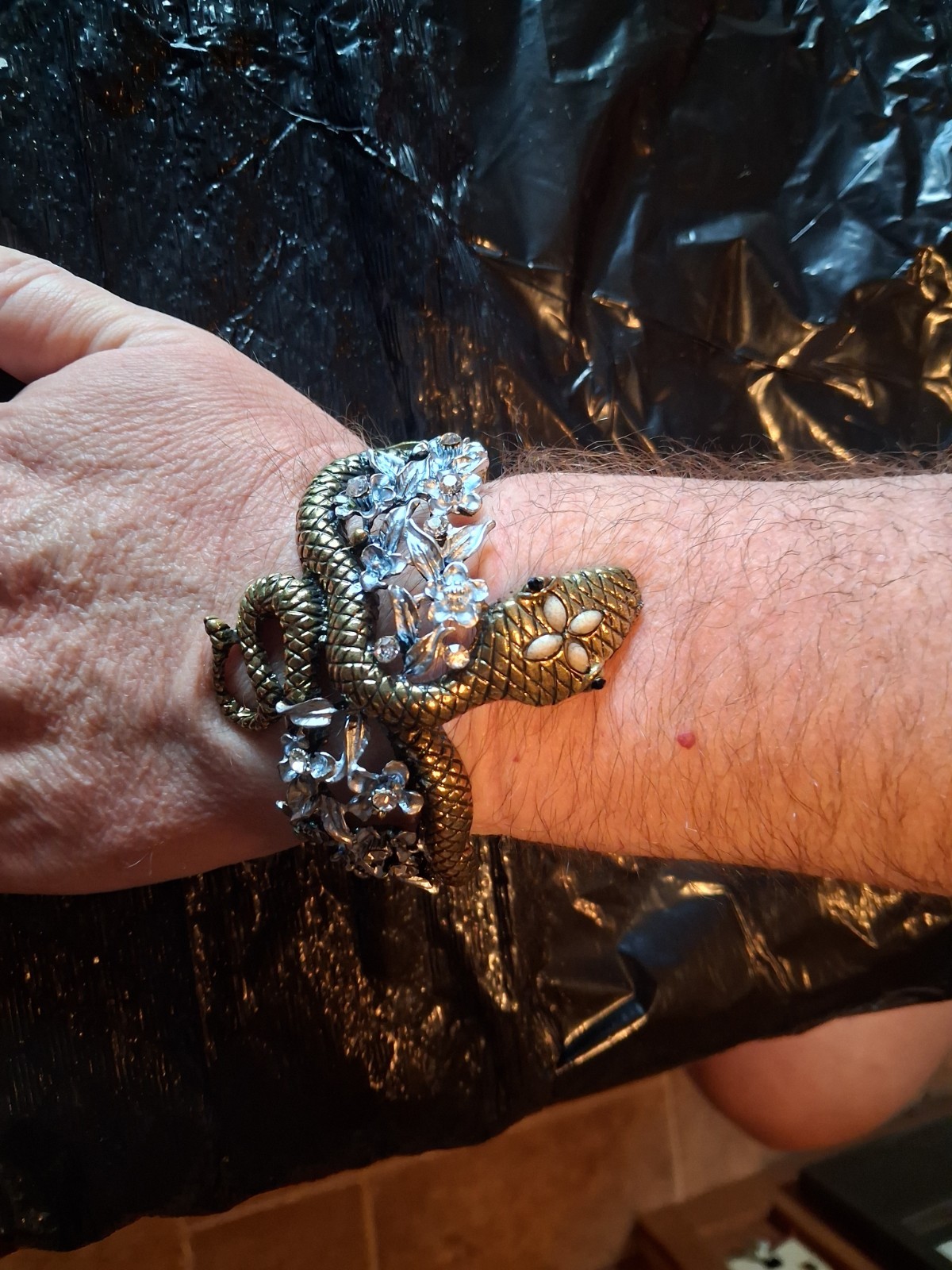 Coiled snake hinge cuffed bracelet