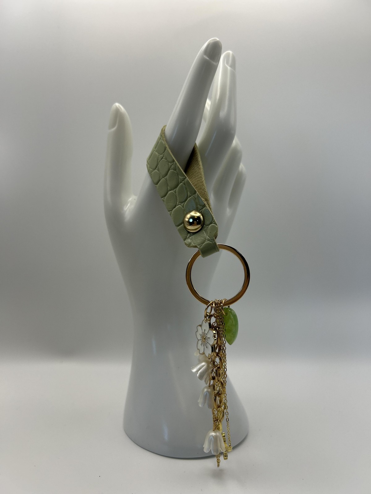 Bracelet Green Faux Leather Snap Tassel Charm Flower Cross Gold Tone 9.5 In