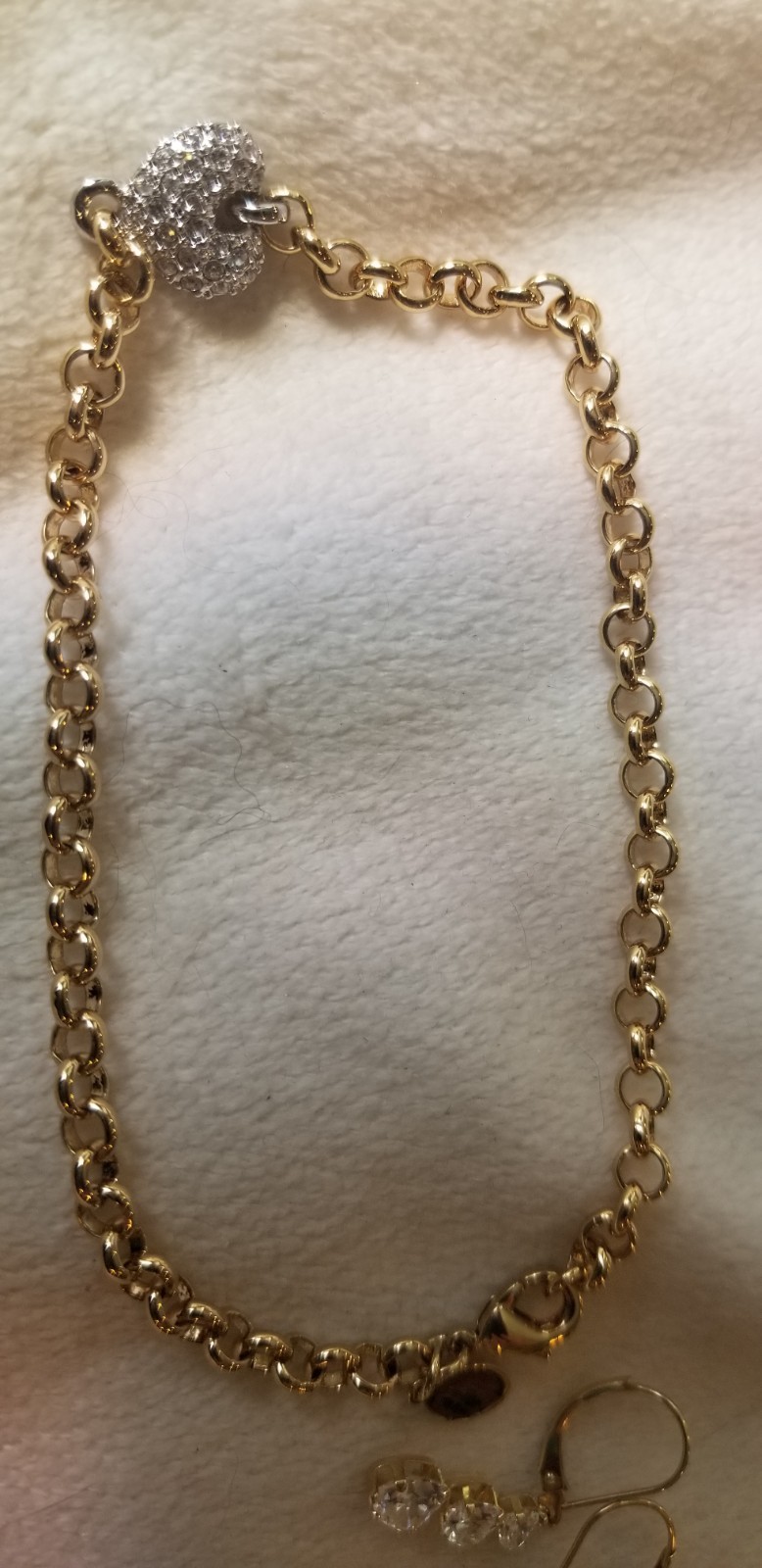 Costume jewelry matching bracelet earrings gold tone band silver heart accent