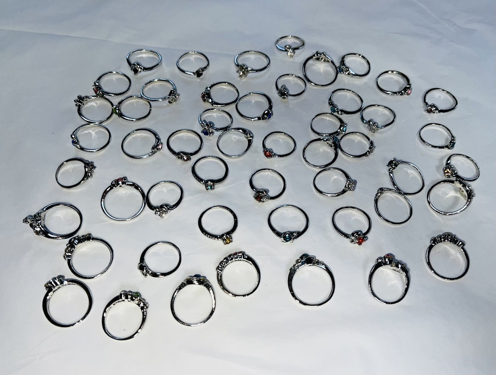 Bundle Of 50 Lovely Silver Coloured Rhinestone RINGS Single & Multiple Gem Stone