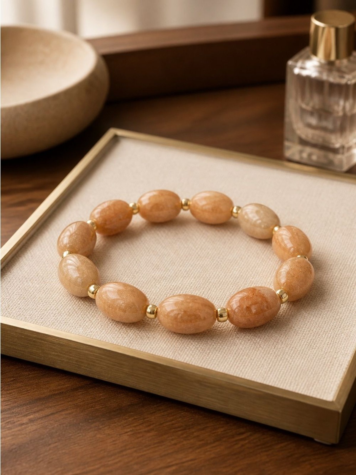 Elegant Peach Stone and Gold Bead Stretch Bracelet
