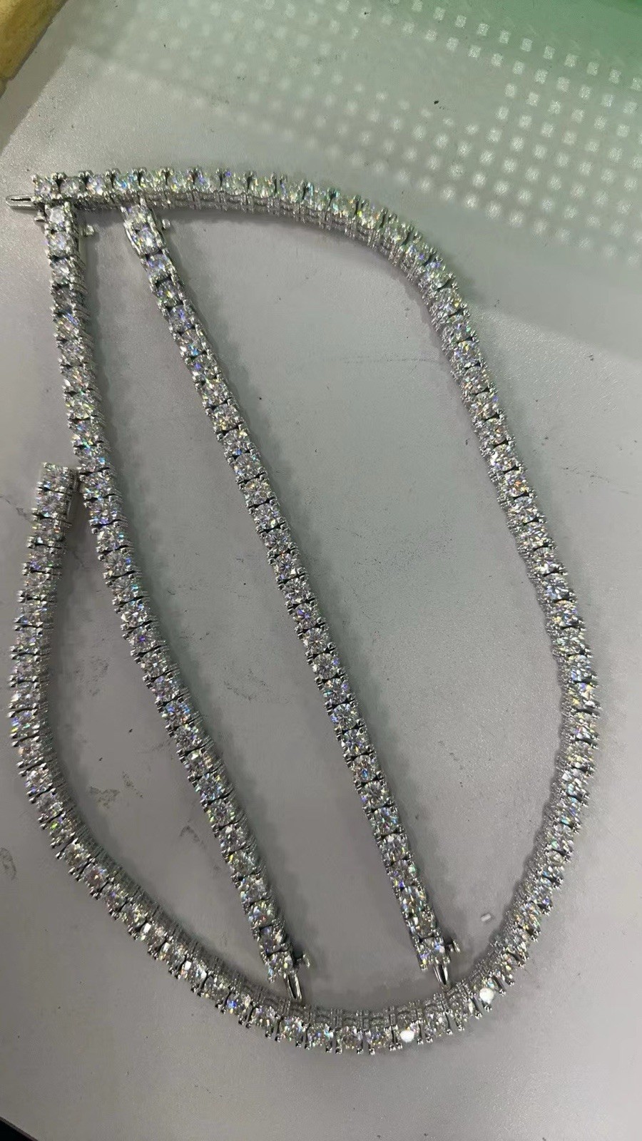 Beautiful 925 sterling silver tennis chain dipped in 14k white gold 22”