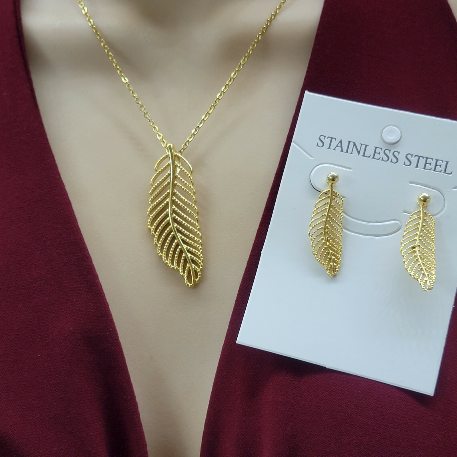 Stainless Steel Gold Plated Elegant Leaf Pendant – Chain – Earrings. Prosperity