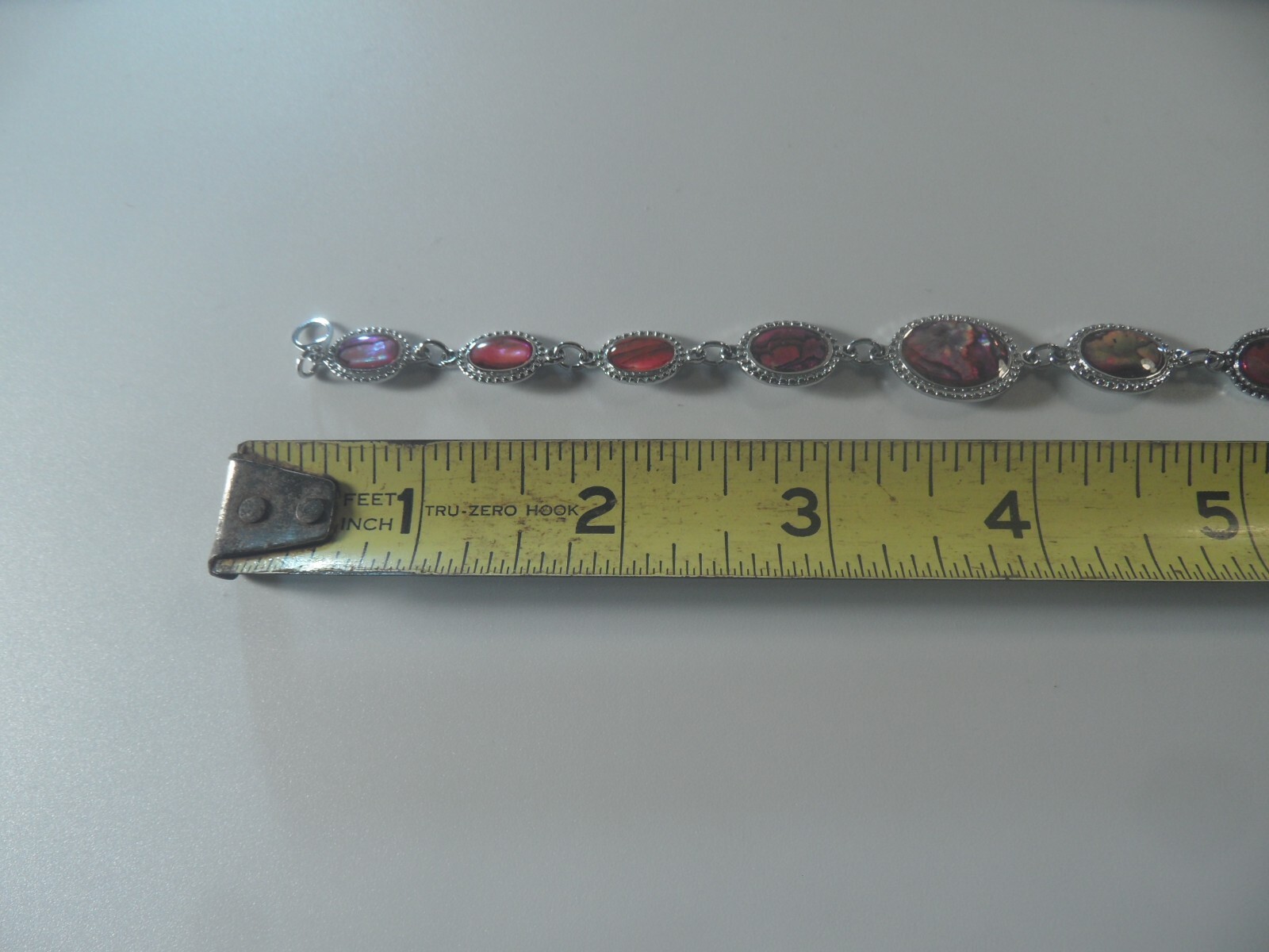 D2- 47 costume jewelry 7″ bracelet silvertone with faux abalone design