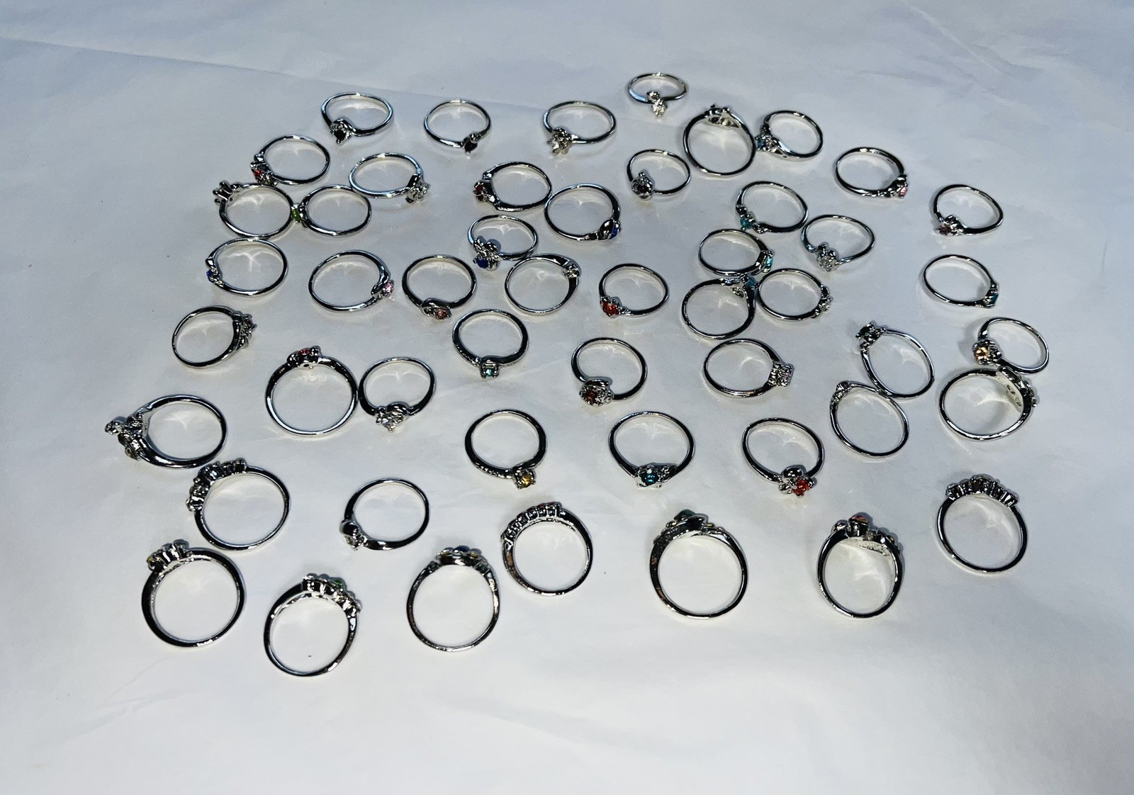 Bundle Of 50 Lovely Silver Coloured Rhinestone RINGS Single & Multiple Gem Stone