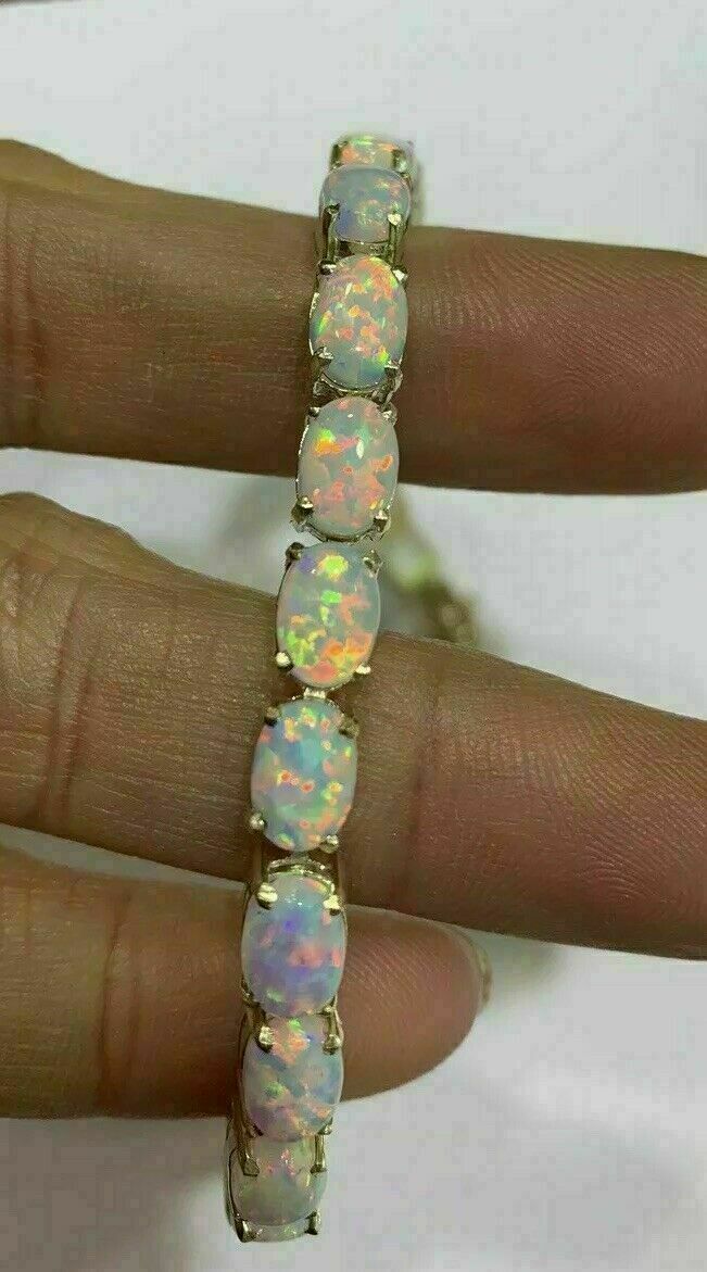 8.15Ctw Simulated Oval Cut Opal Tennis Bracelet 14K Yellow Gold Plated Silver