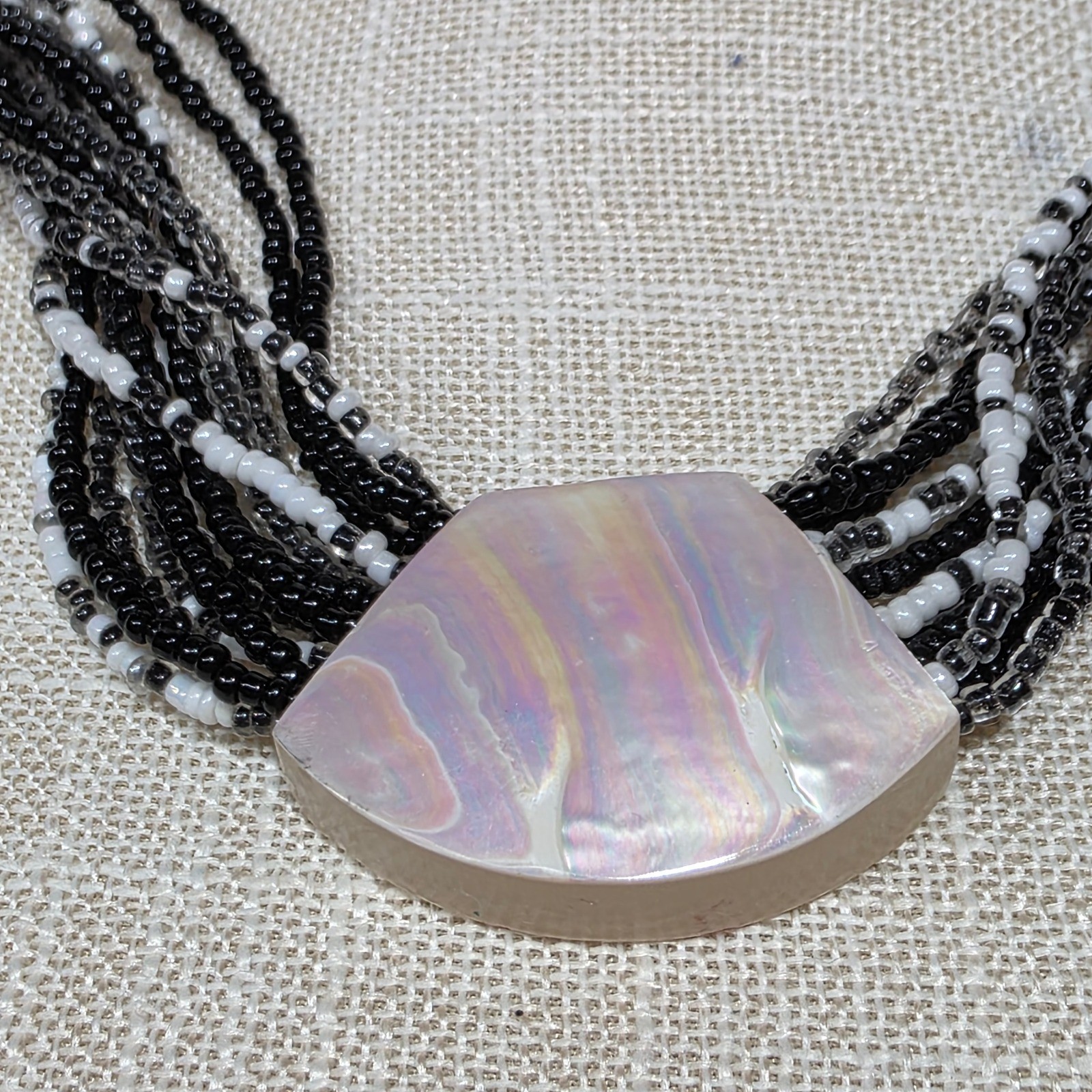 Multi Strand Beaded Necklace with Mother of Pearl Fan Pendant Black White Gray