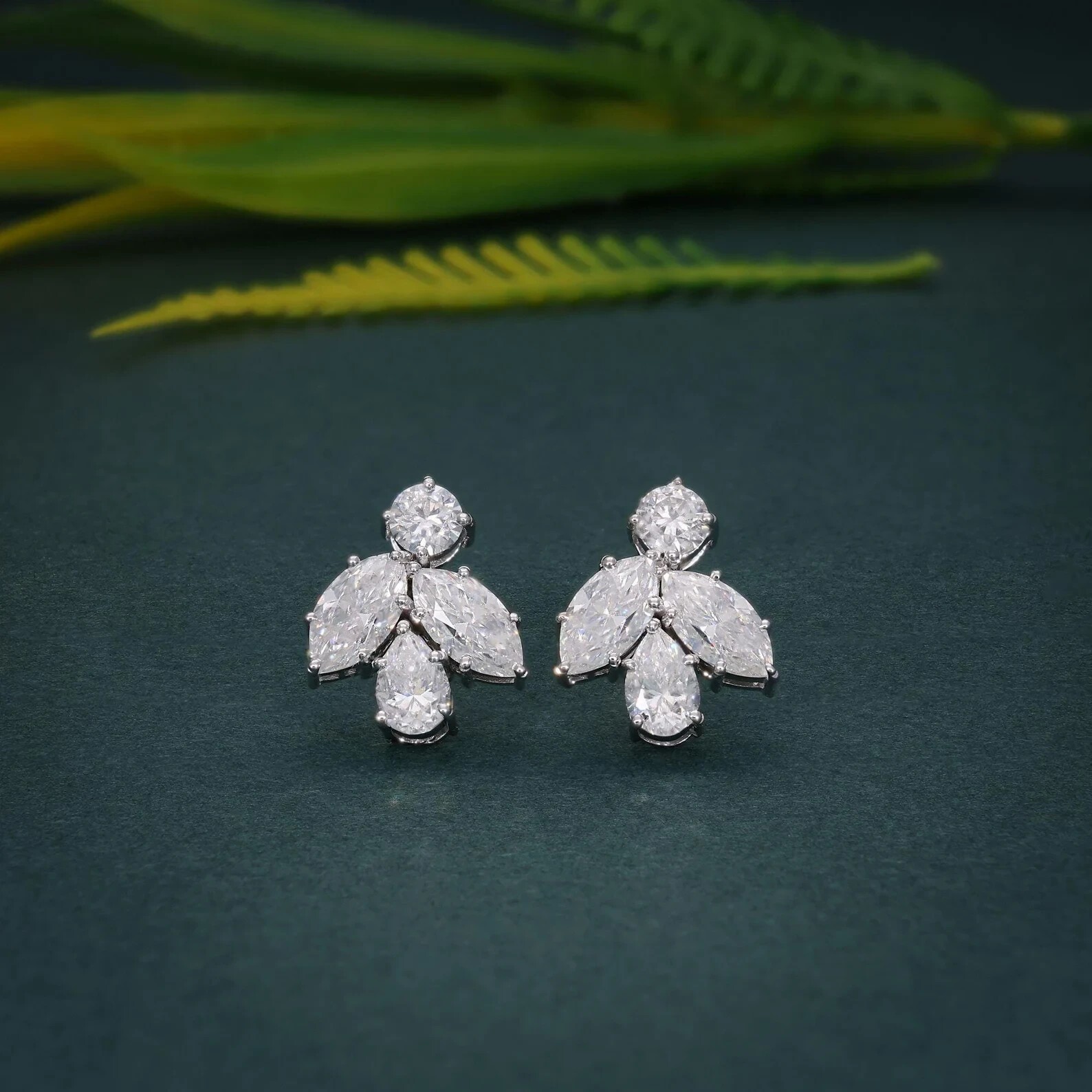 Pear Cut Simulated Diamond Women’s Fancy Stud Earrings In 14k White Gold Plated