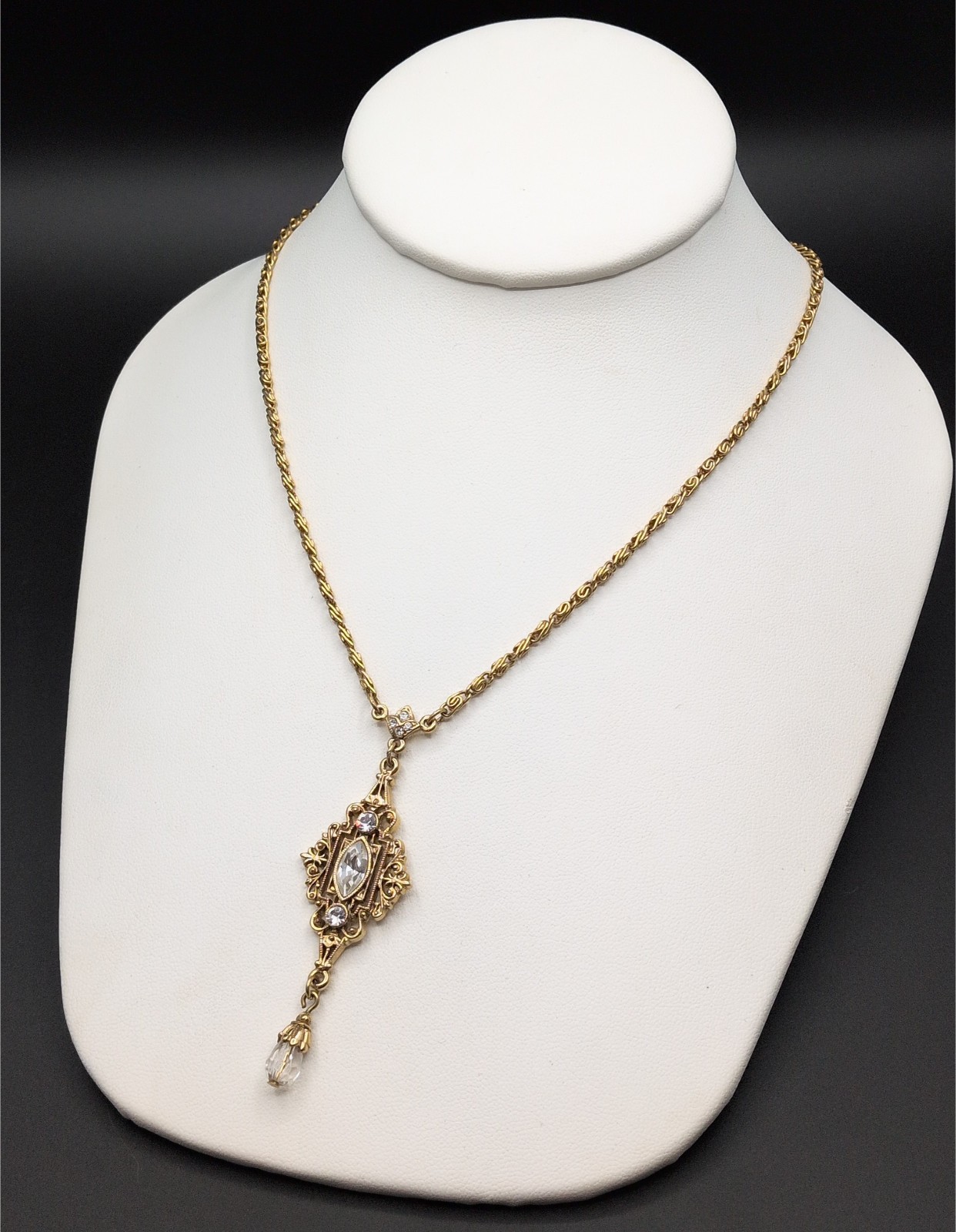 Necklace 1928 Gold Tone Open Work Scroll Pendant Clear Rhinestones Drop 17.25″
