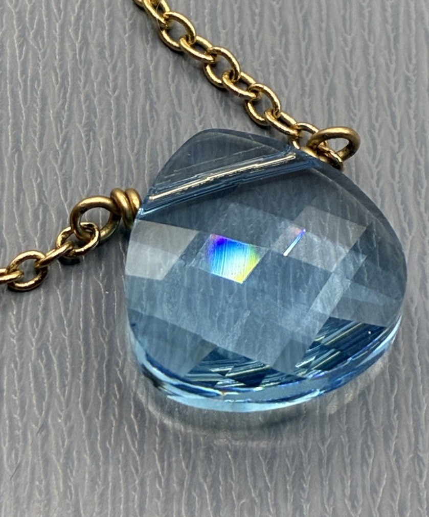 Touchstone Light Sapphire, Briolette, Swarovski Crystal Gold Tone Necklace
