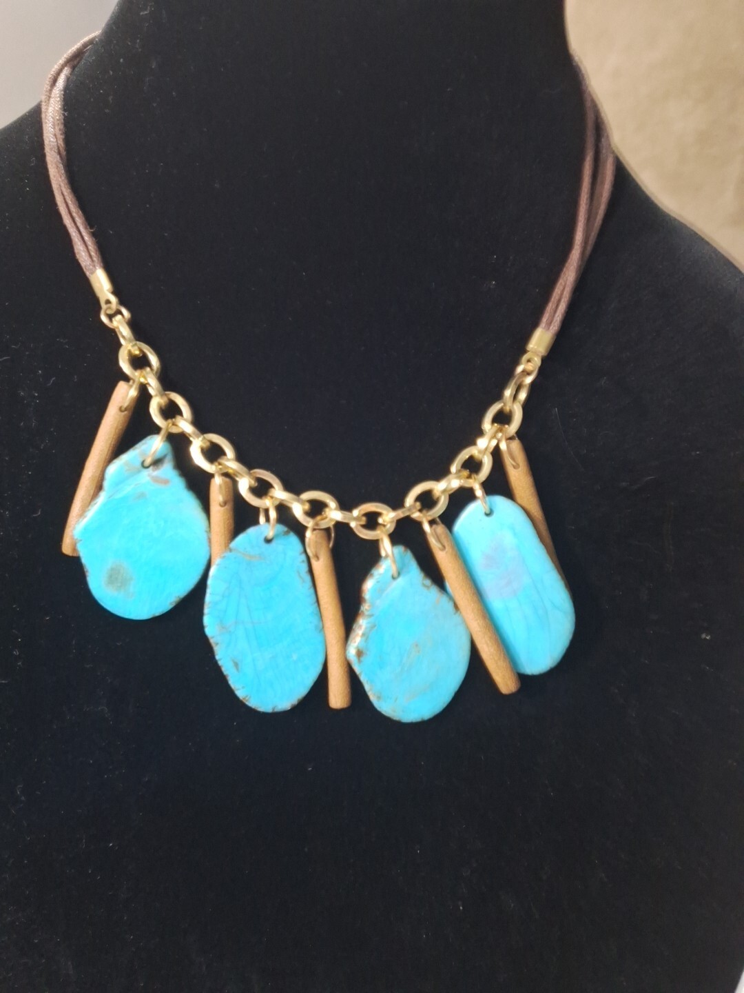 ladies turquoise Necklace On Gold And Leather Can Be 16 Ins To 20 Ins Long