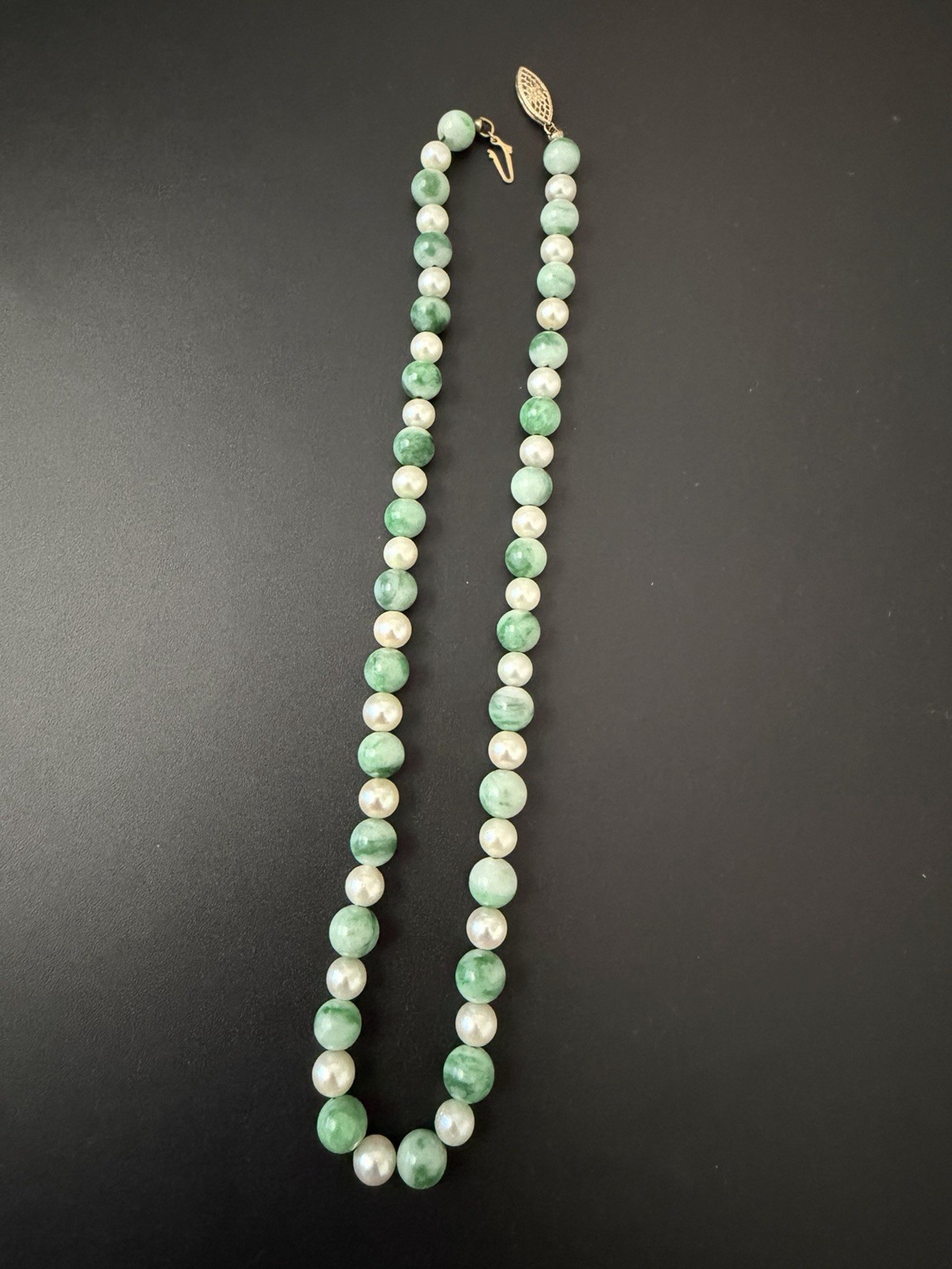 Vintage green jade and white pearl beads 14k yellow gold clasp.