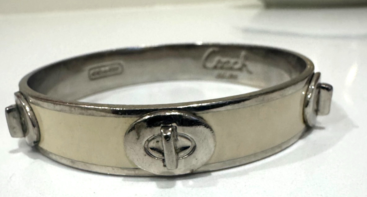 Coach Signature Silver / Cream Accent Tone Bangle Bracelet