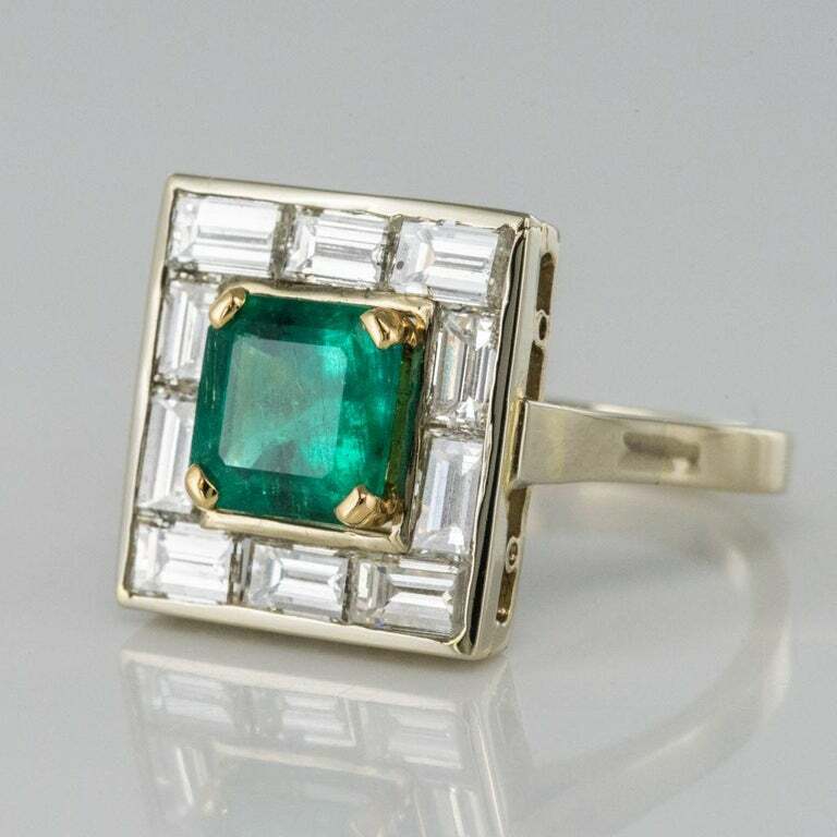 Claw Set Square 1.62CT Emerald Surrounded By Ten Baguette Cut 1.96CT CZ Ring
