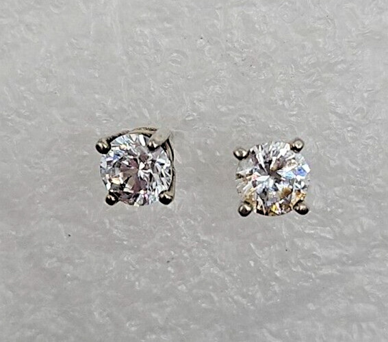 2 sets of cubic zirconia stud earrings. See Pictures & Description!! Pre loved