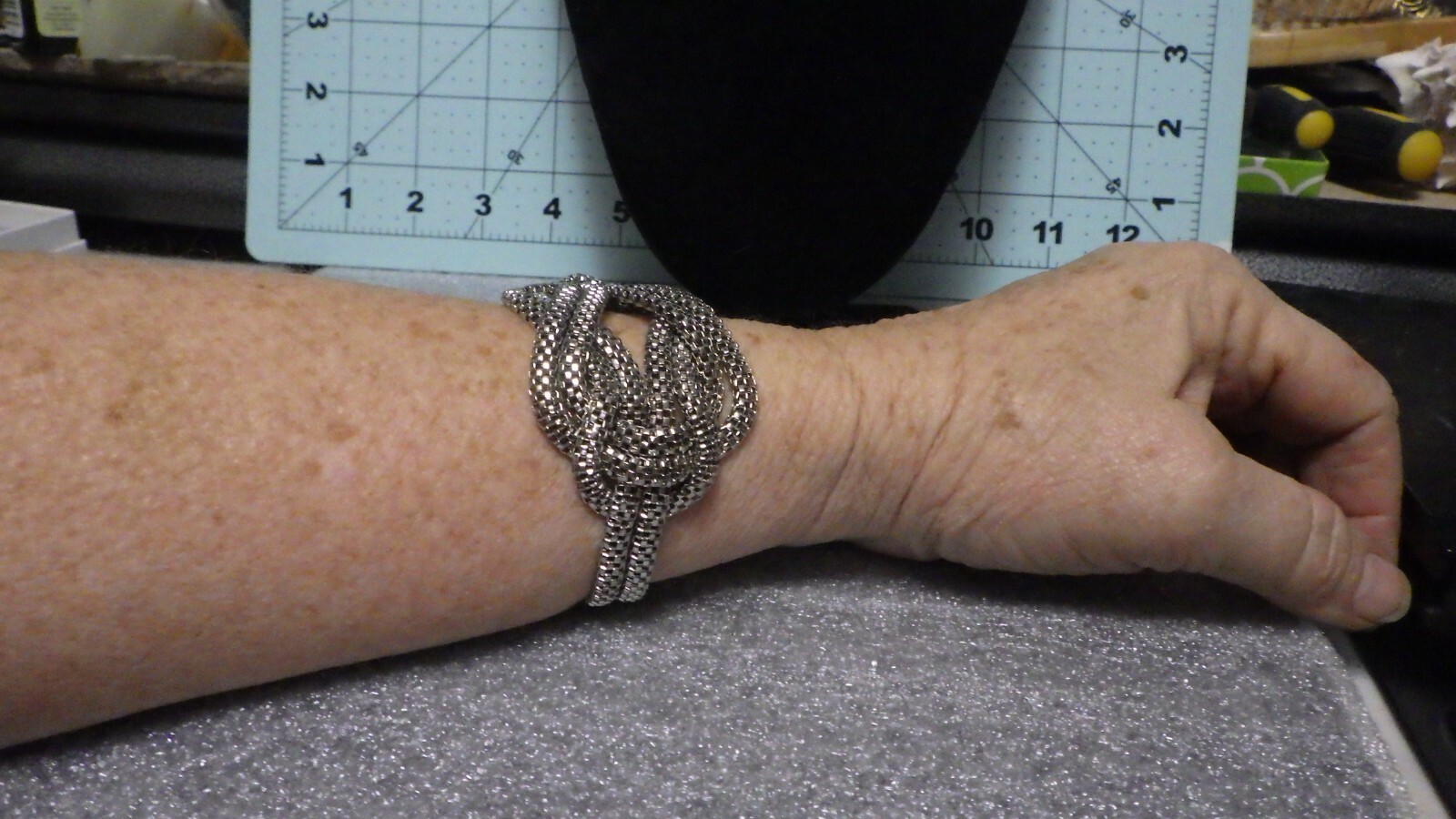 silver tone woven and pretty knot bracelet large 8 1/2 X 1 1/2″ inches!