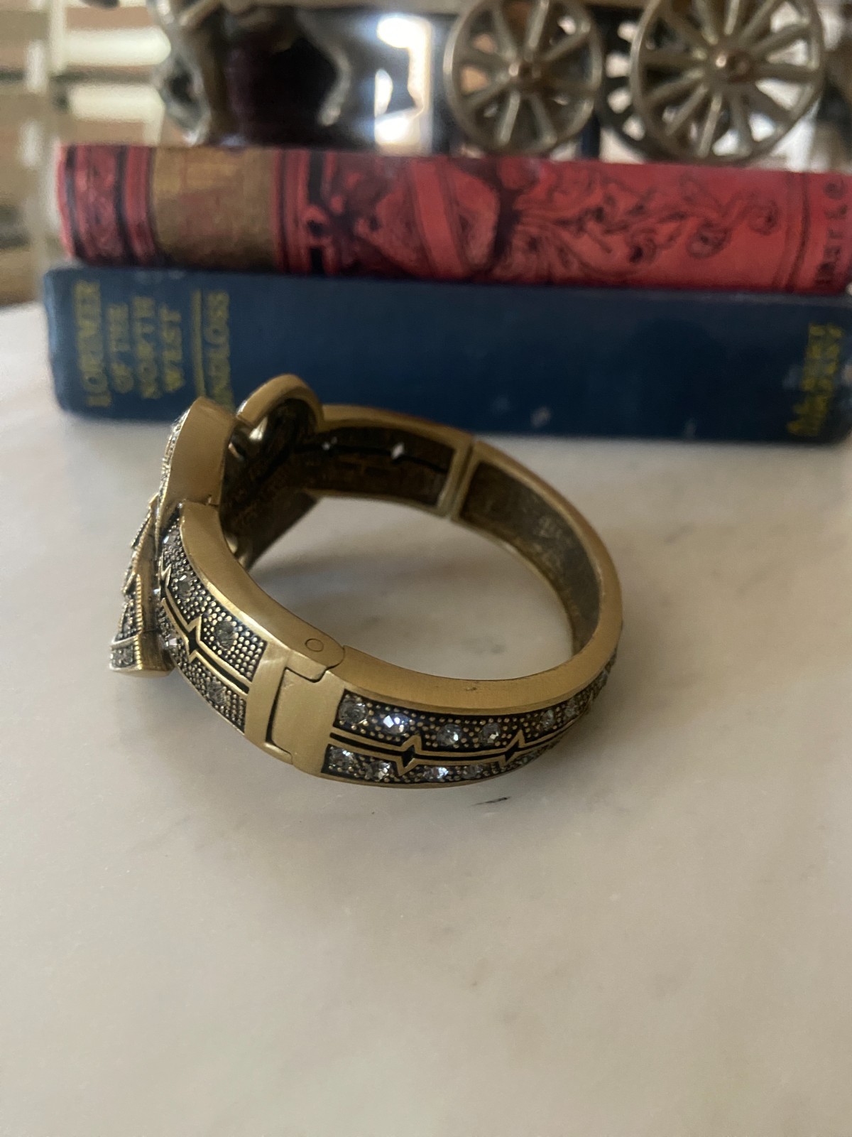 Heidi Daus Bow Ribbon Crystal Clamper Bracelet Gold Tone Filigree Hinged Cuff