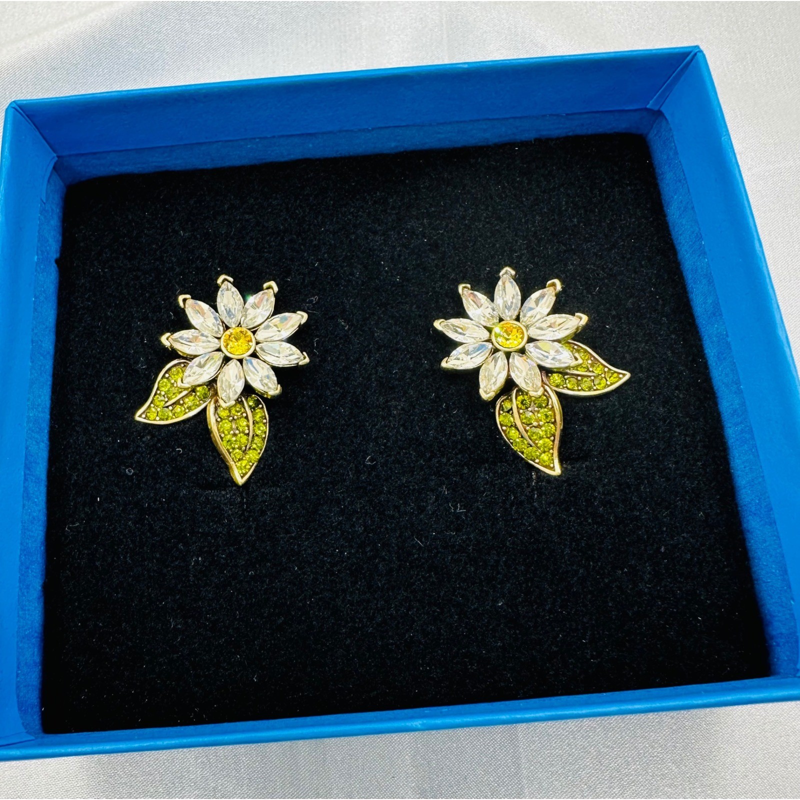Heidi Daus Crystal Daisy Flower Omega Back Earrings Bronze Tone Green Yellow