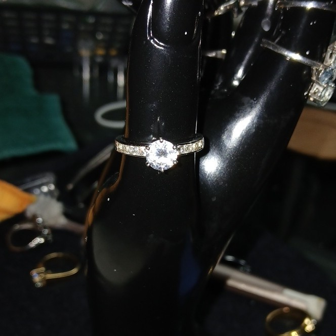Sterling silver round white CZ solitaire with accents band ring. Size 8