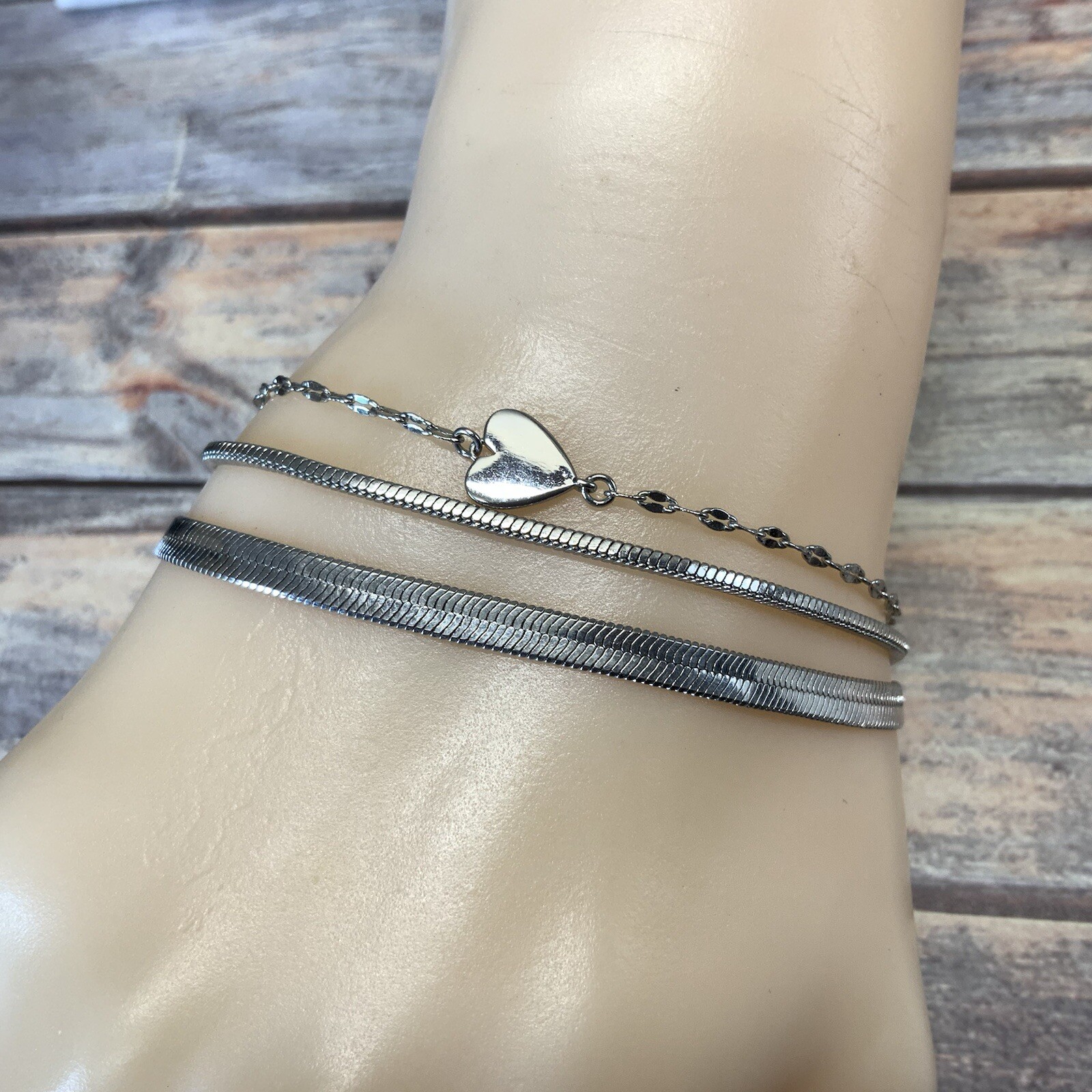 Modern adjustable layered herringbone chain heart bracelet in silver tone