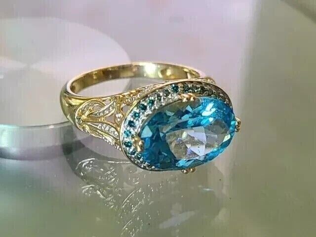 2 Ct Oval Cut Simulated Blue Topaz Halo Engagement Ring 14K Yellow Gold Plated