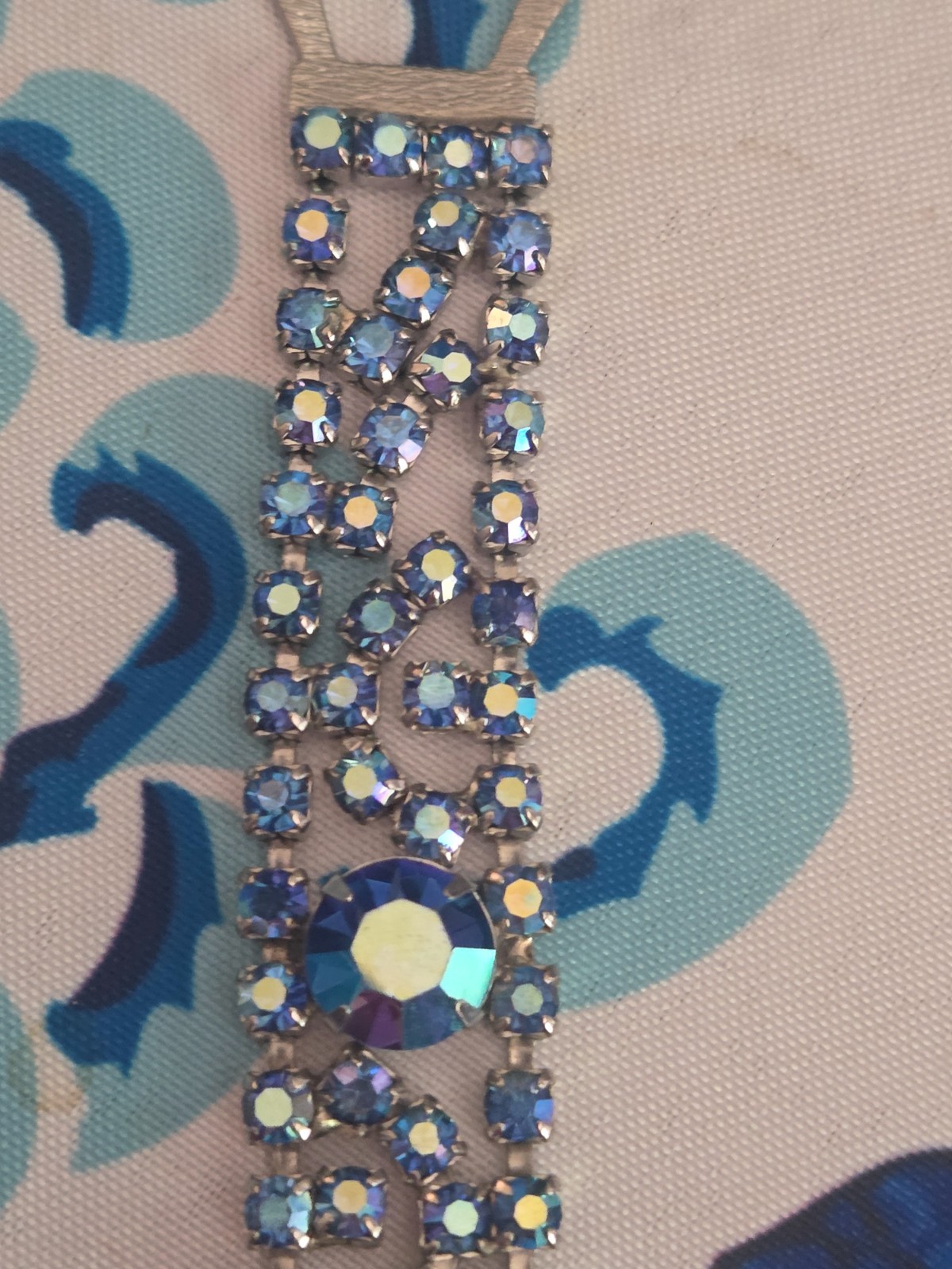 Iridescent blue rhinestone bracelet possibly vintage. Eight inches around