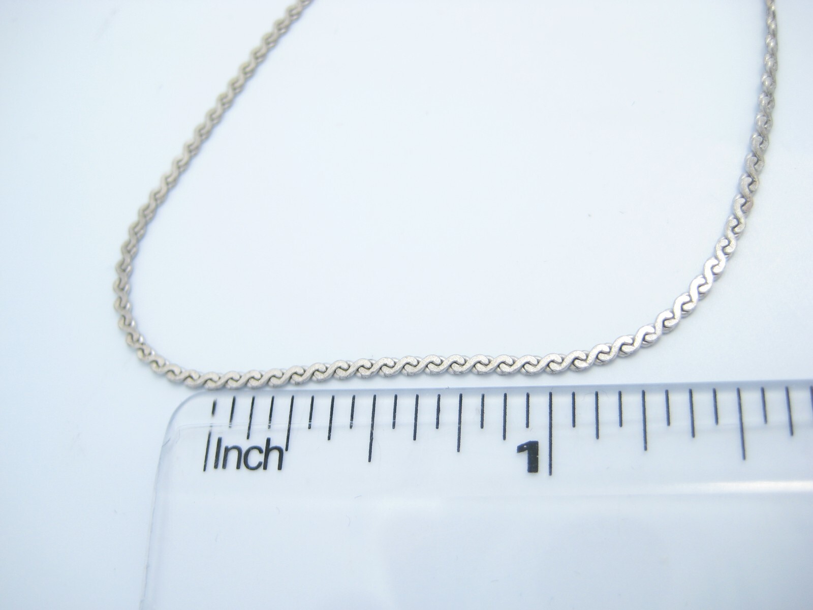 Sterling Silver Flat Serpentine Chain Link 0.5mm Bracelet 7″