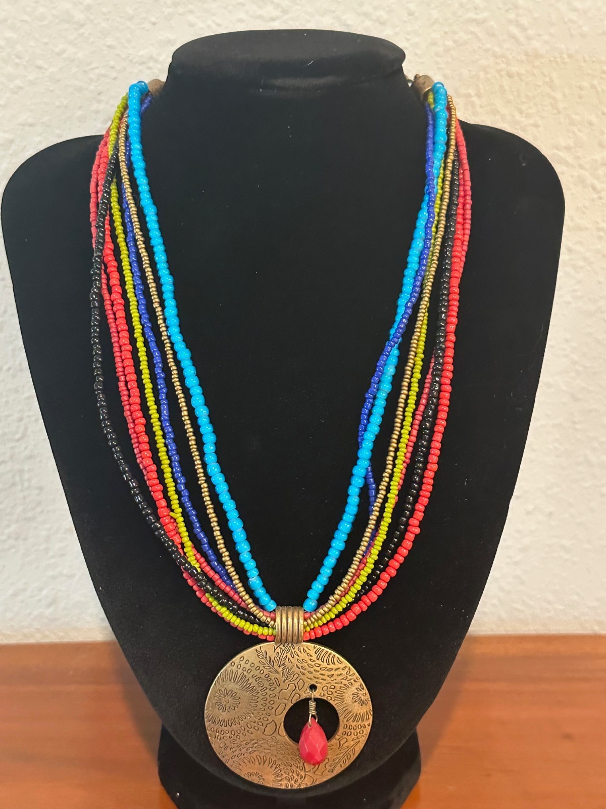 Chico’s Necklace Multi Colored Glass Seed Bead Multi-Strand Brass Tone Pendant