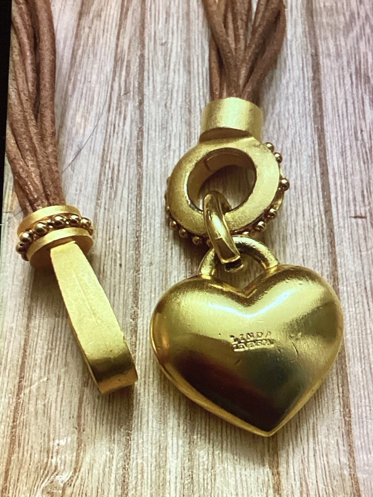 Linda Levinson Gold Tone Multi Corded Chunky Heart Pendant Choker Necklace.