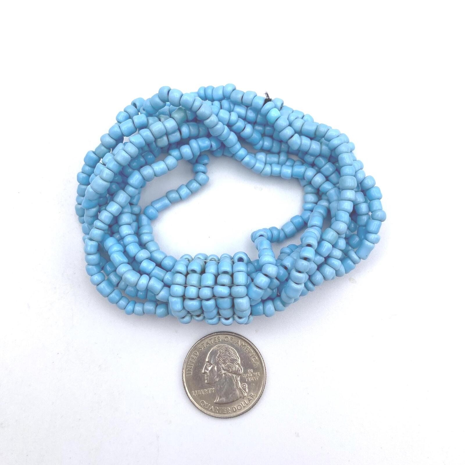 Vintage Blue Glass and Black Elastic Beaded 8 Strand 7 Inch Elastic Bracelet.